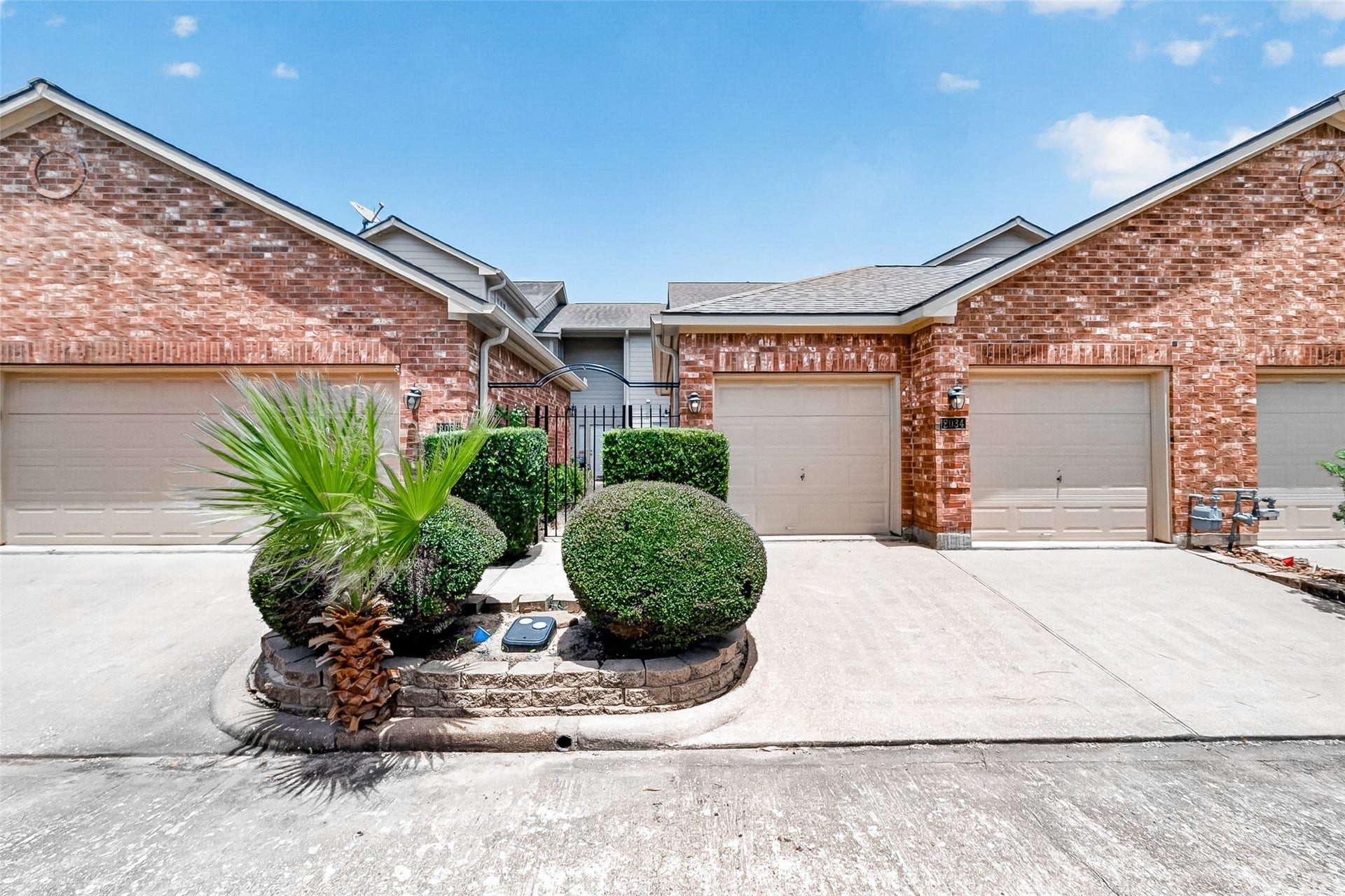 2034 Glencove Drive, Seabrook, TX 77586 Inviting front exterior with classic brick and landscaping