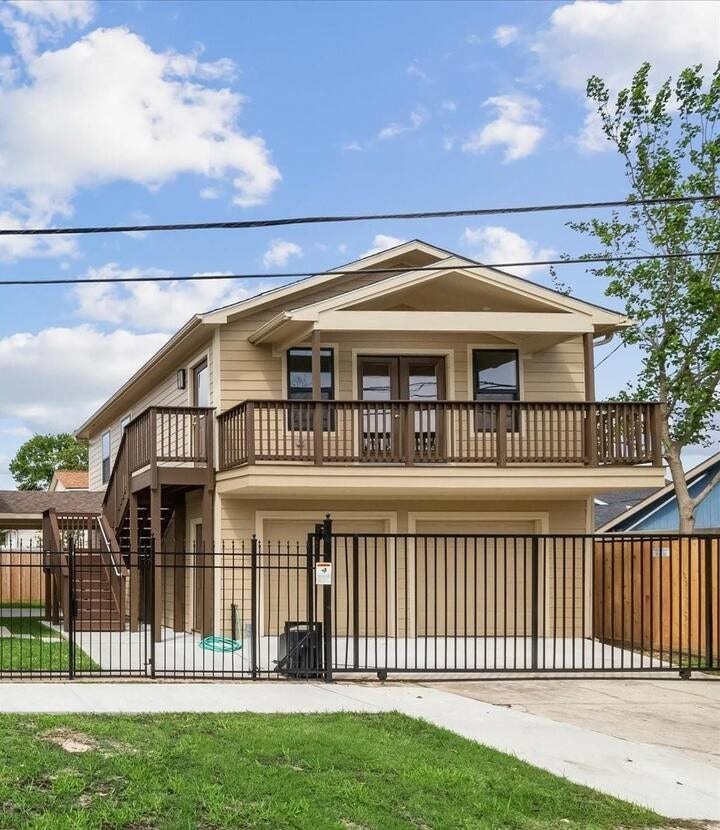 Welcome to this charming second-floor garage apartment, featuring its own separate entrance and a covered balcony.