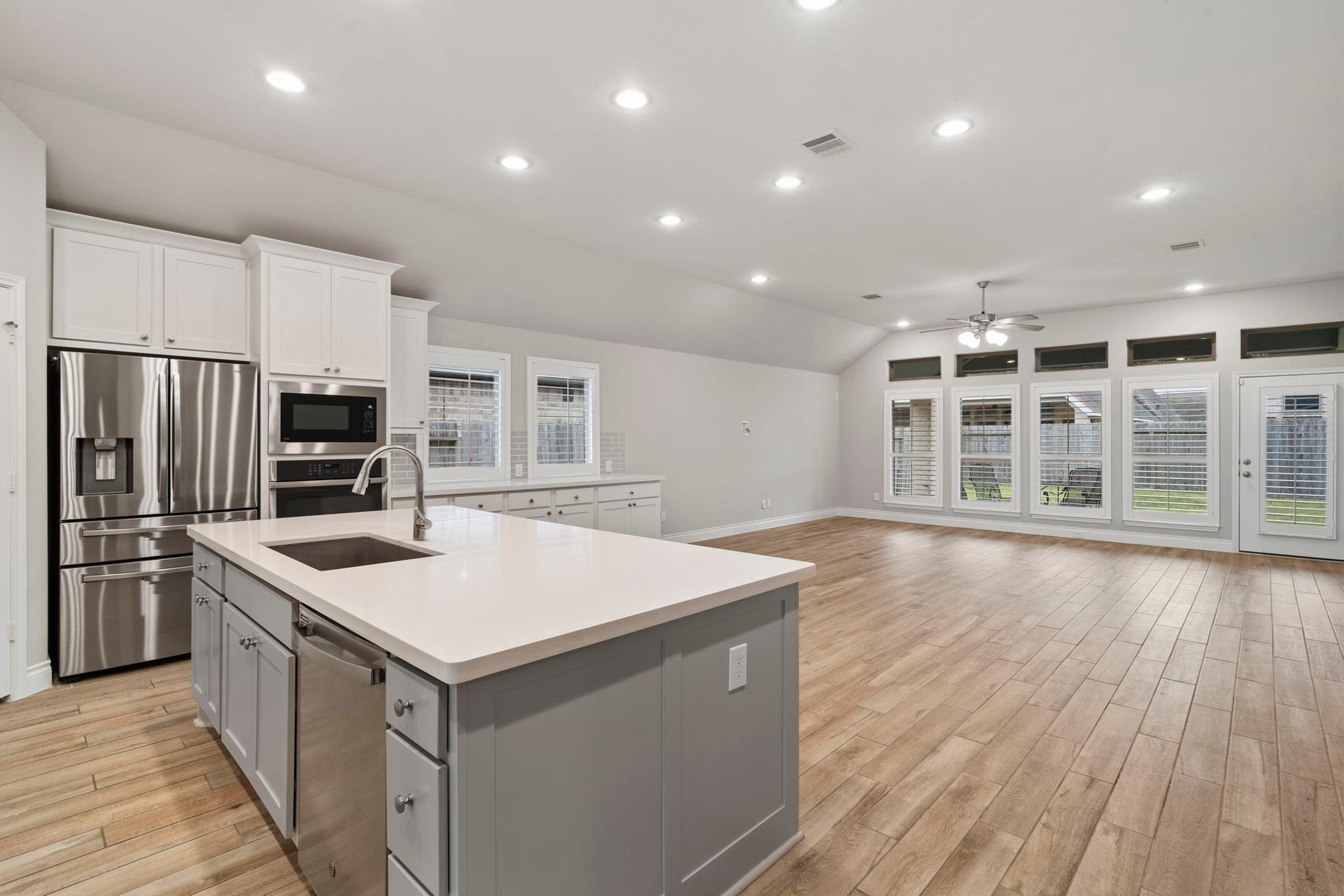 2315 Calm Channel Court, Missouri City, TX 77459 Ceiling-height cabinetry maximizes storage while creating a clean, finished look.