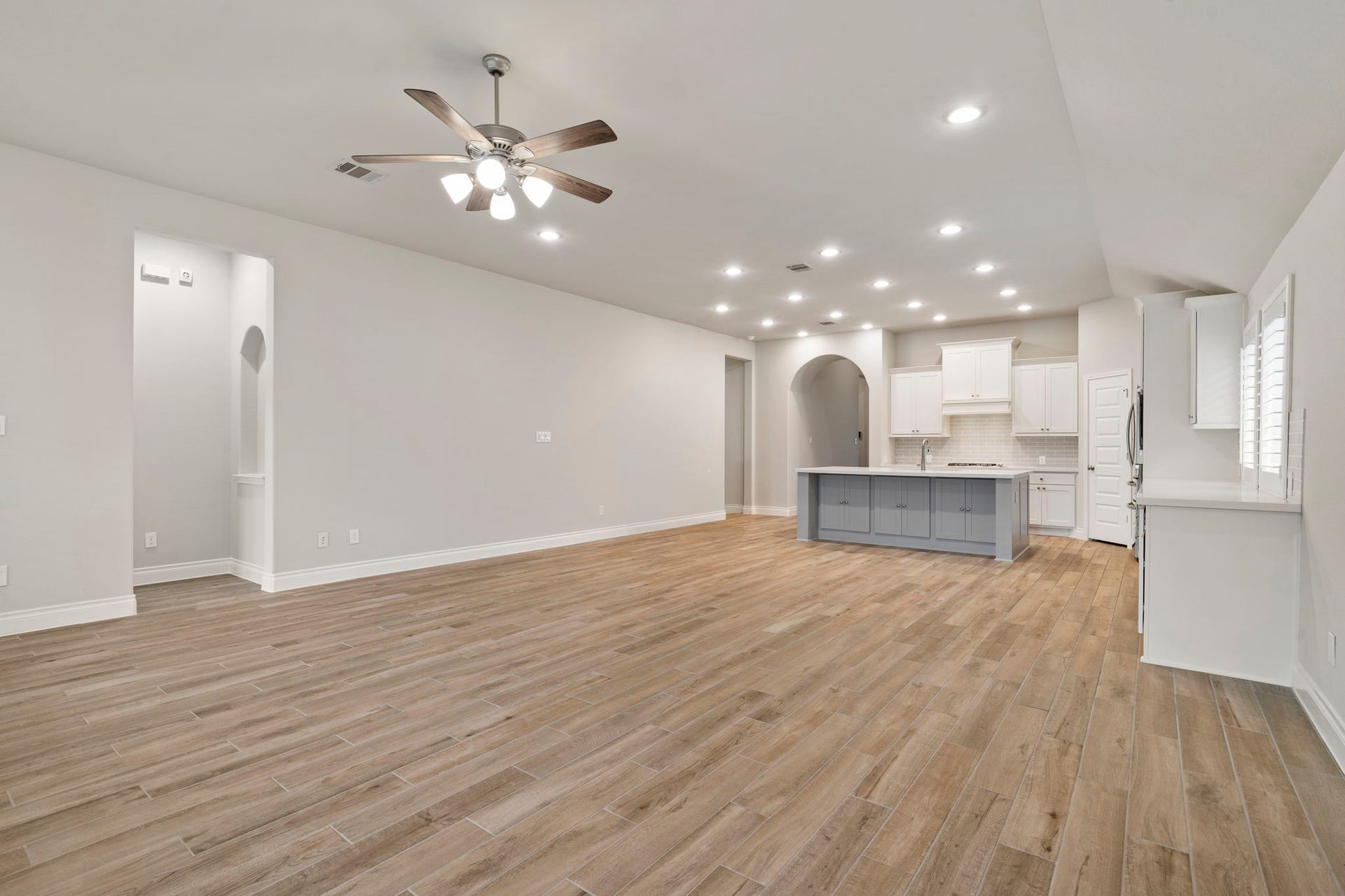 2315 Calm Channel Court, Missouri City, TX 77459 This view of the family room highlights the entrance to the private owners suite.