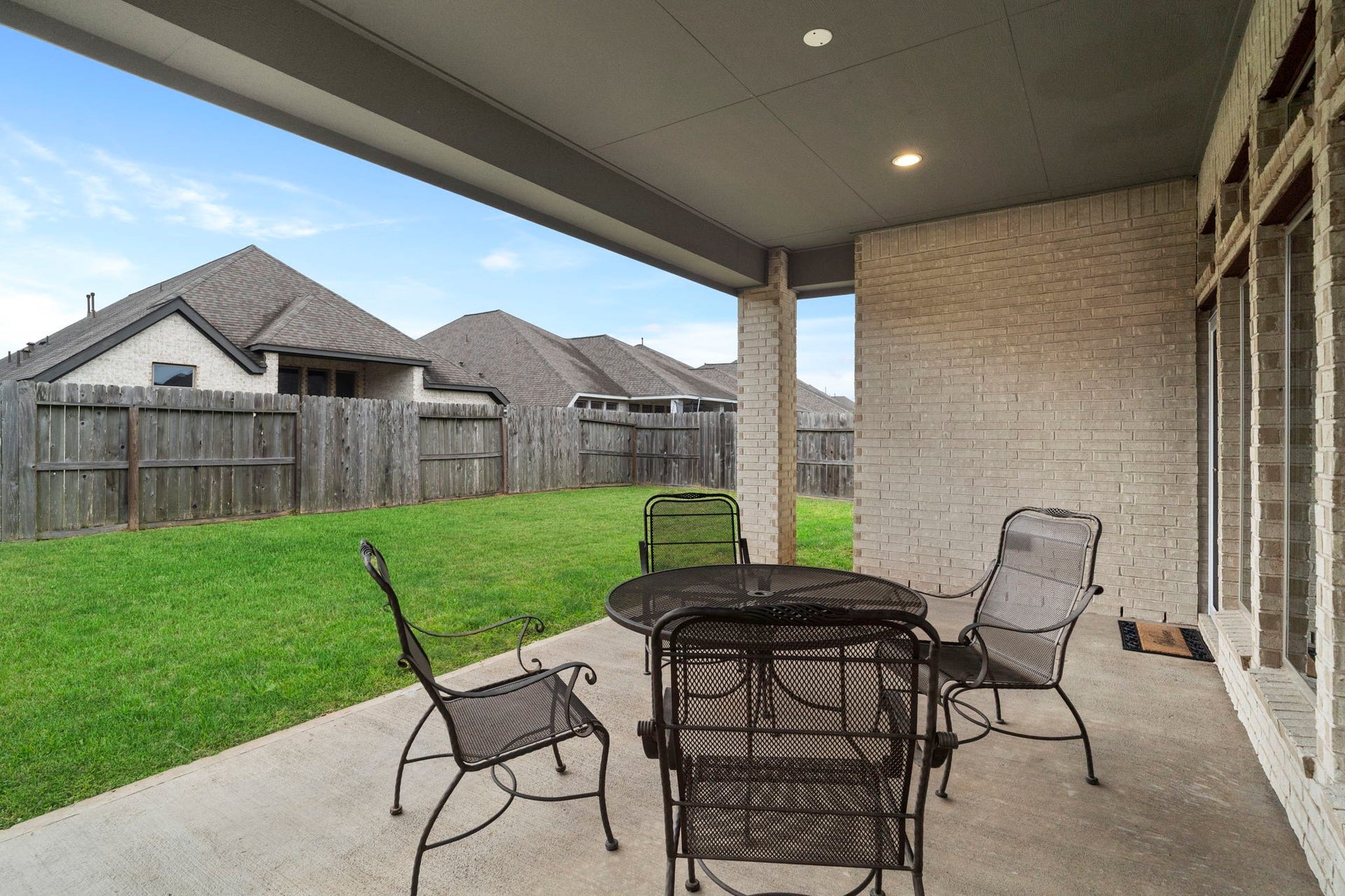 2315 Calm Channel Court, Missouri City, TX 77459 Enjoy the covered backyard patio for outdoor dining and relaxation in any weather.