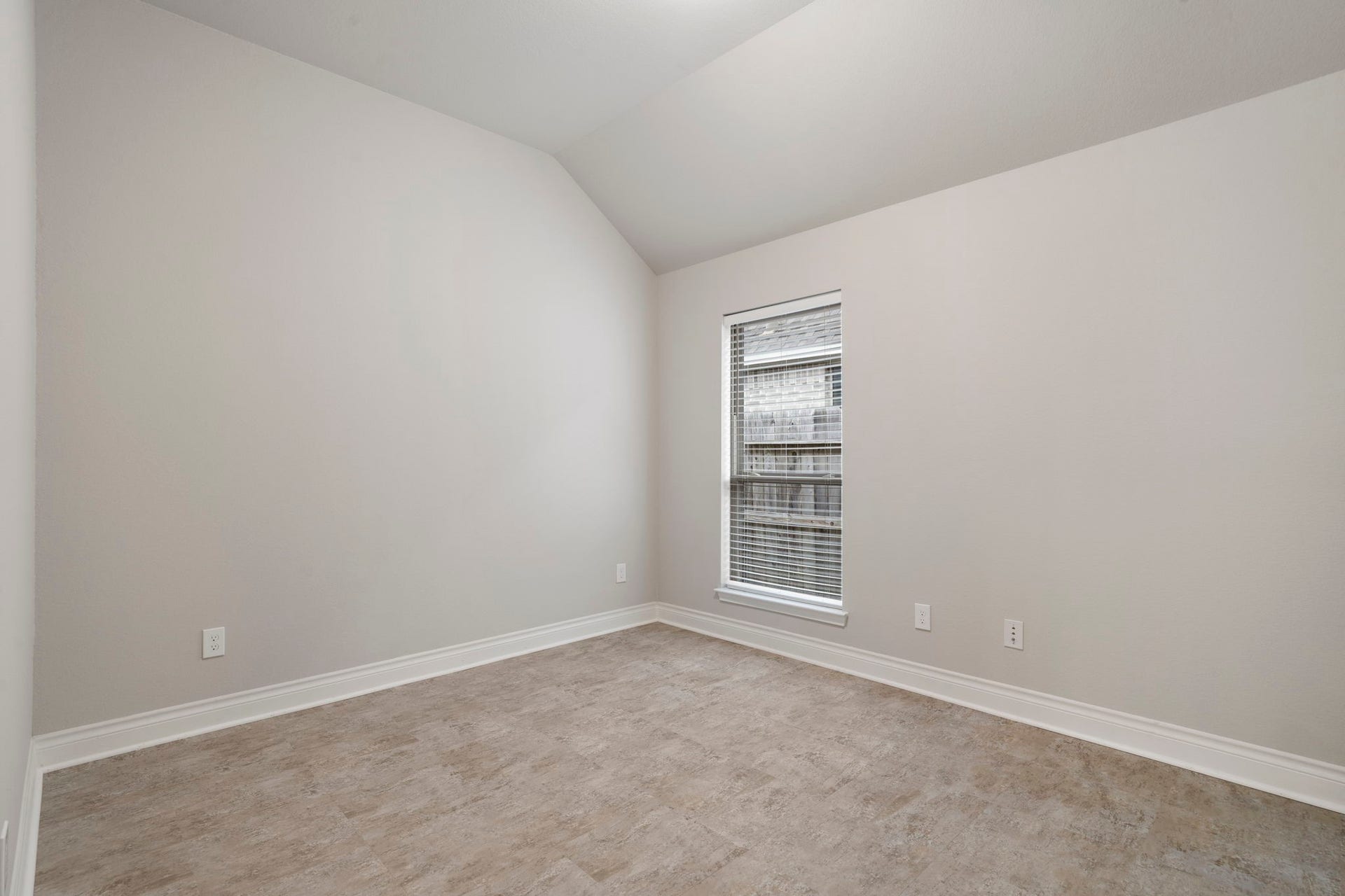 2315 Calm Channel Court, Missouri City, TX 77459 Travertine tile flooring makes this versatile room ideal for a home gym, hobby space, or additional bedroom.