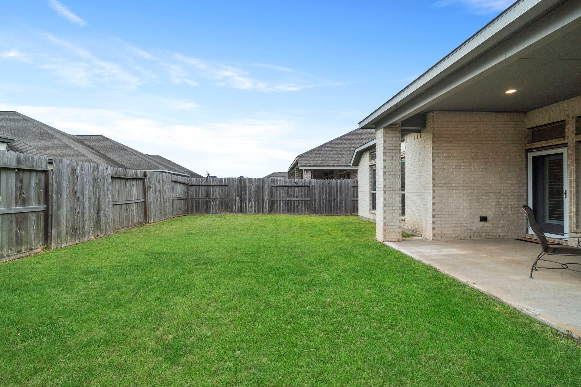 2315 Calm Channel Court, Missouri City, TX 77459 A spacious grassy yard offers plenty of room for kids to play, pets to roam, and outdoor activities.