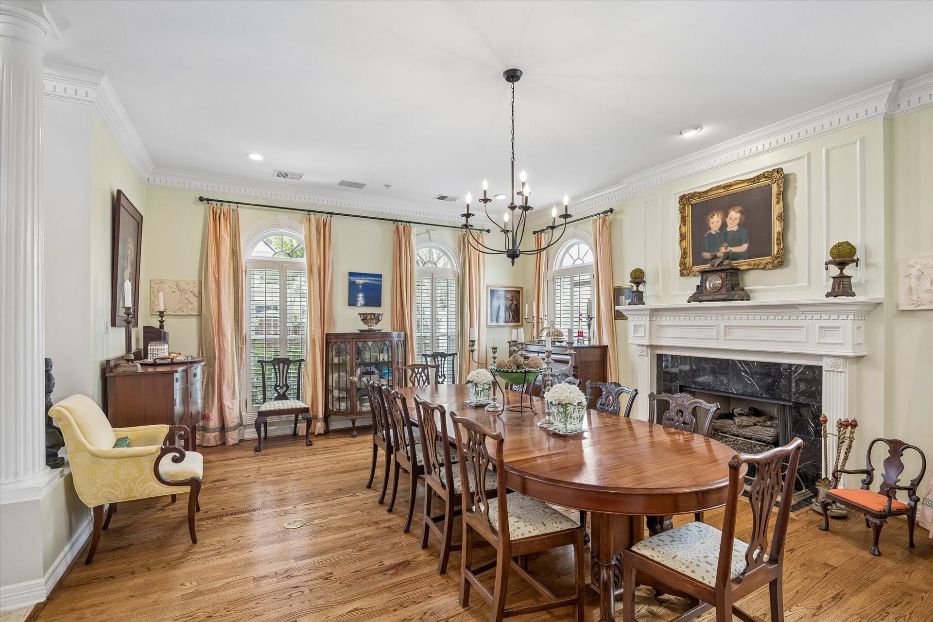 2120 Potomac Drive, #A, Houston, TX 77057 To the left of the entryway is an airy formal dining room. Complemented by a large fireplace with a stone surround, this room is the perfect setting for entertaining.