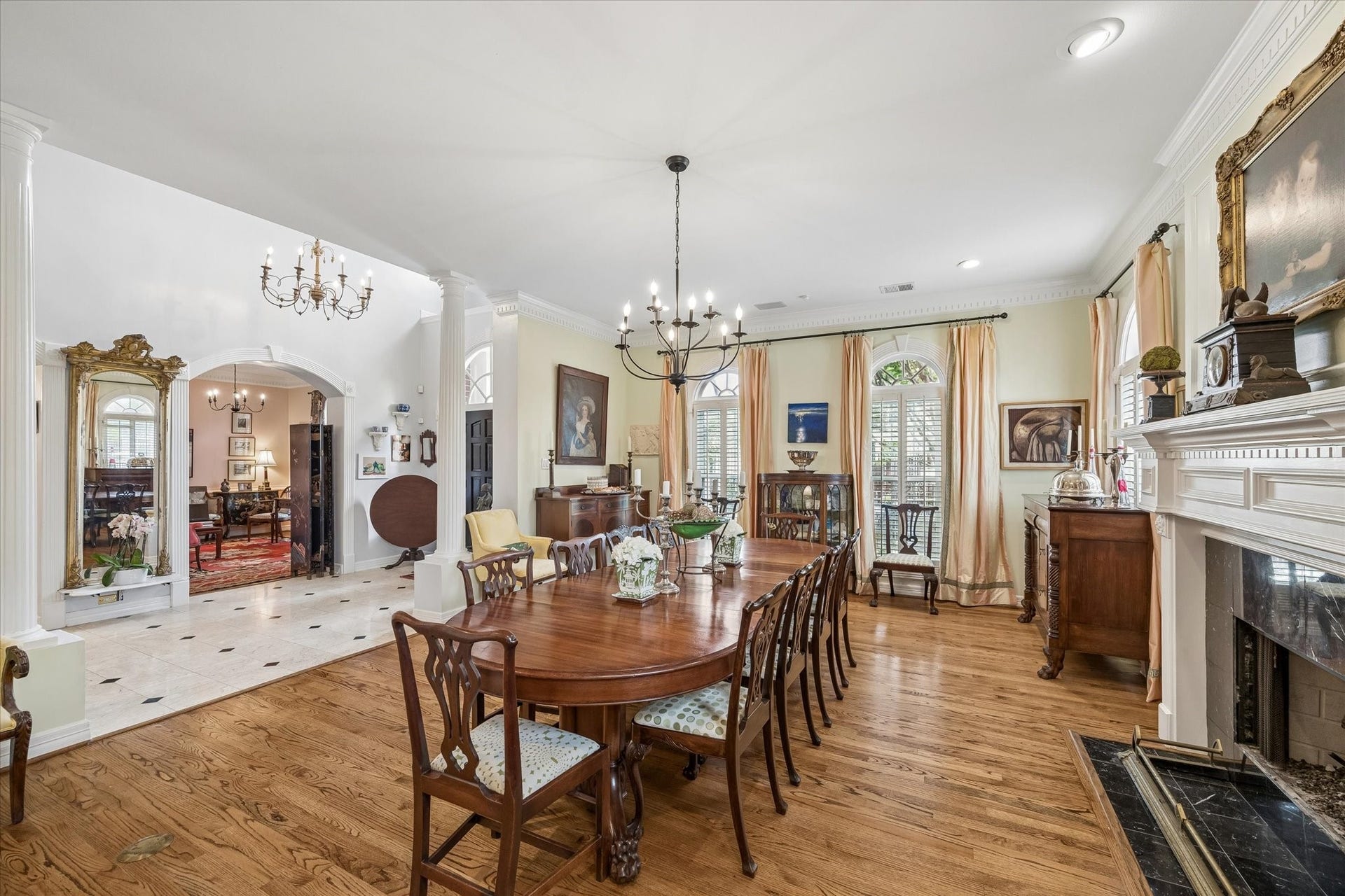 2120 Potomac Drive, #A, Houston, TX 77057 Hardwood floors, walls of windows, and dental molding accent the space.