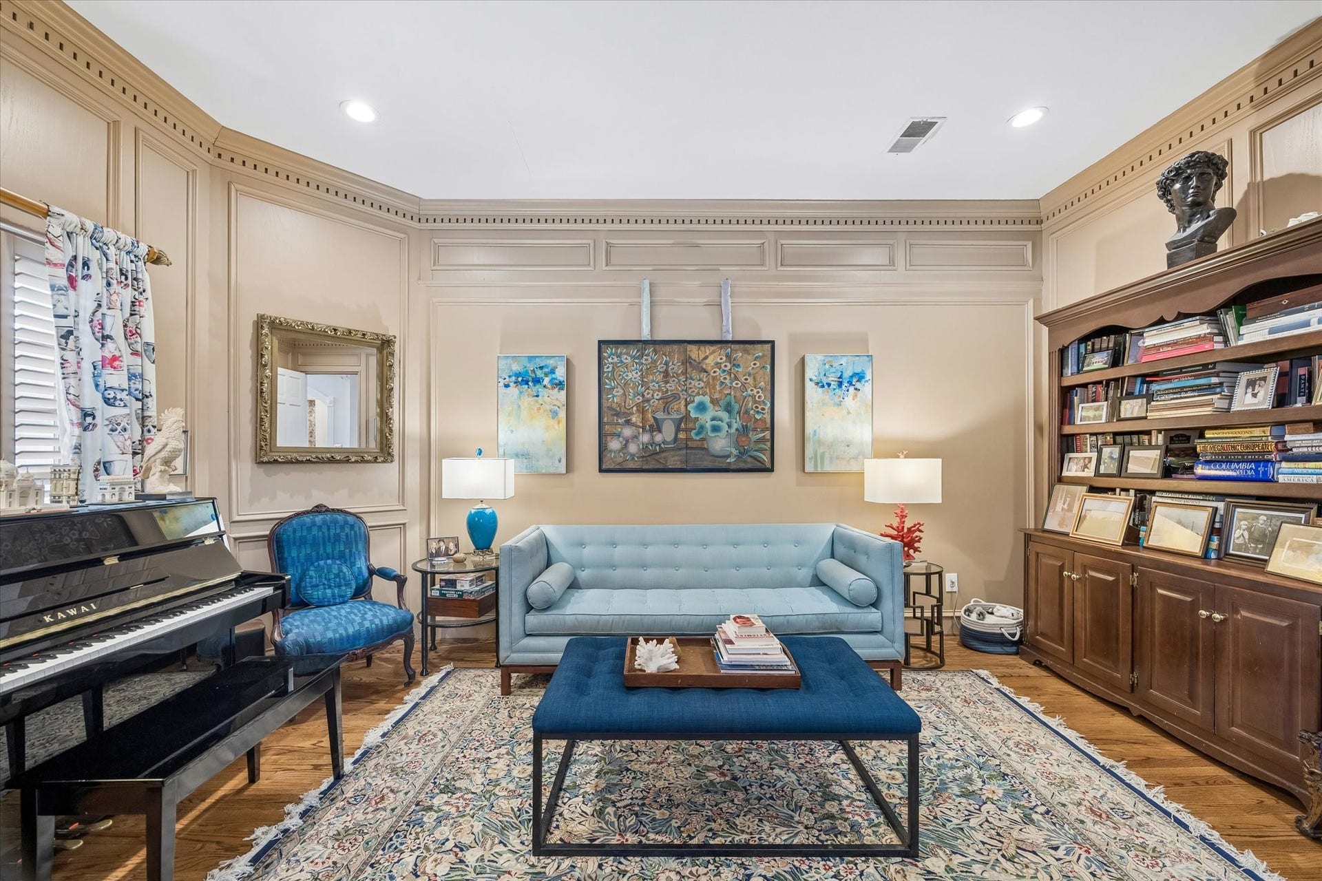 2120 Potomac Drive, #A, Houston, TX 77057 Just off the dining room is the library. Pocket doors allow this room privacy from the dining room. Could be used as a study or den as well! Notice the painted wainscoting and dental molding.