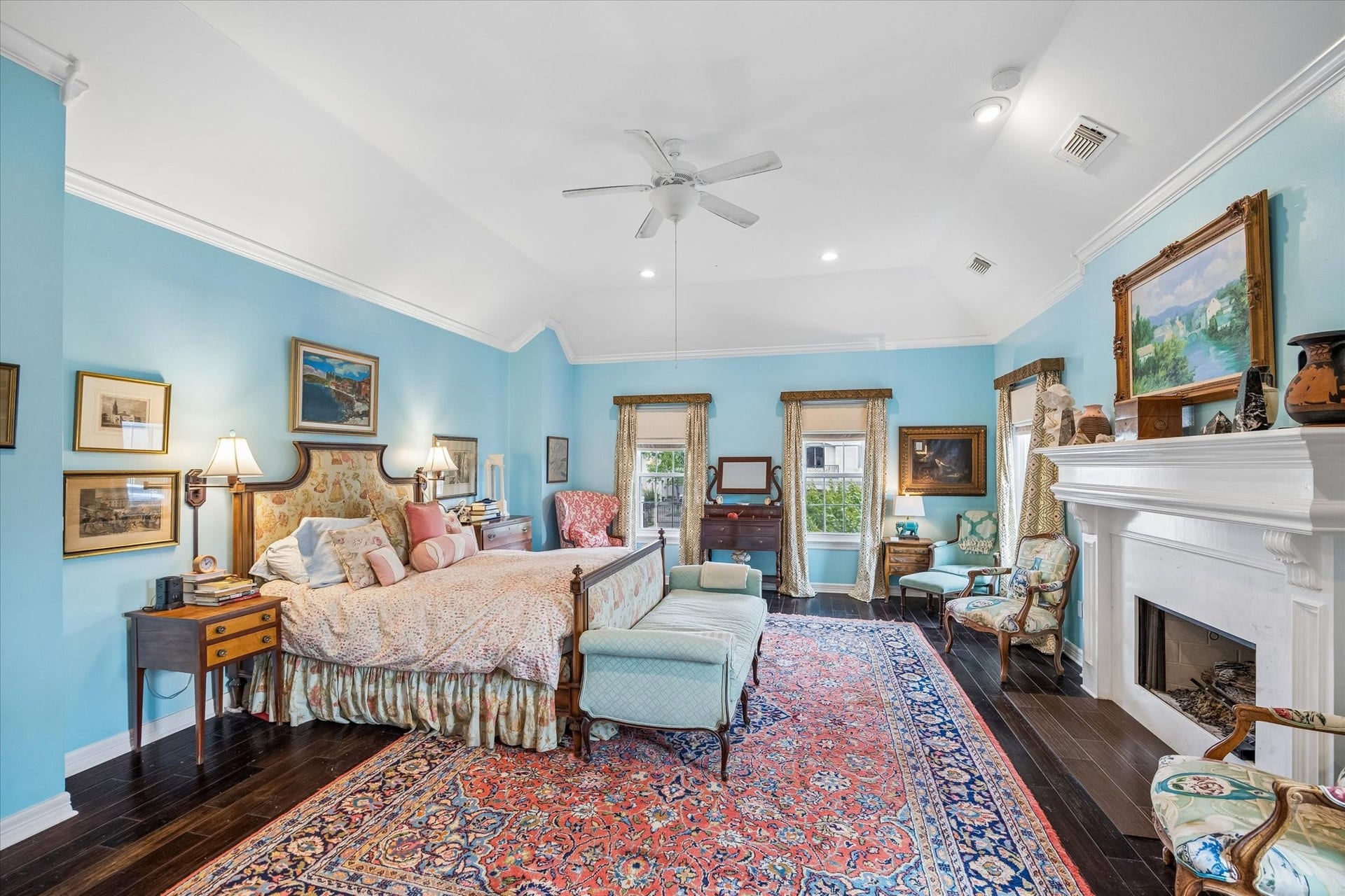 2120 Potomac Drive, #A, Houston, TX 77057 The dark hardwood floors set the primary apart from the rest of the home. Also features crown molding and a tray ceiling.