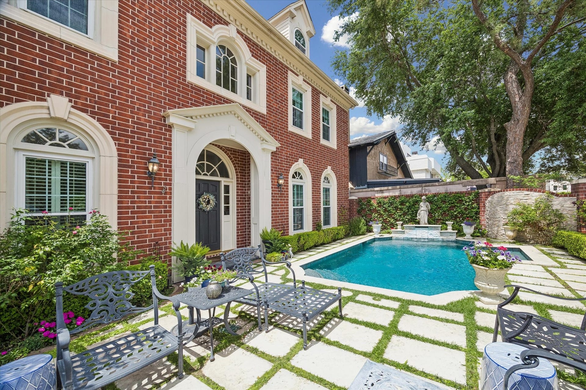 2120 Potomac Drive, #A, Houston, TX 77057 Welcome to 2120 Potomac Drive Unit A in sought after Westhaven Estates! As you step through the front gate, you are greeted by a sparkling heated pool surrounded by travertine tile and lush landscaping. To the left of the pool is space for an outdoor entertaining area.