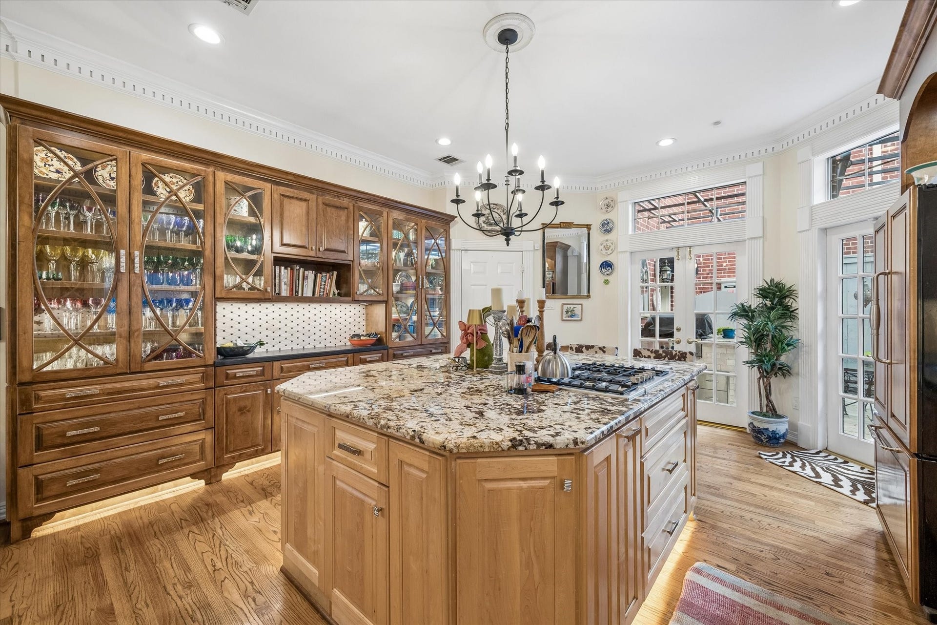 2120 Potomac Drive, #A, Houston, TX 77057 So warm and inviting! The kitchen also has access to the two car garage and back patio. The garage features storage shelves and a work bench.