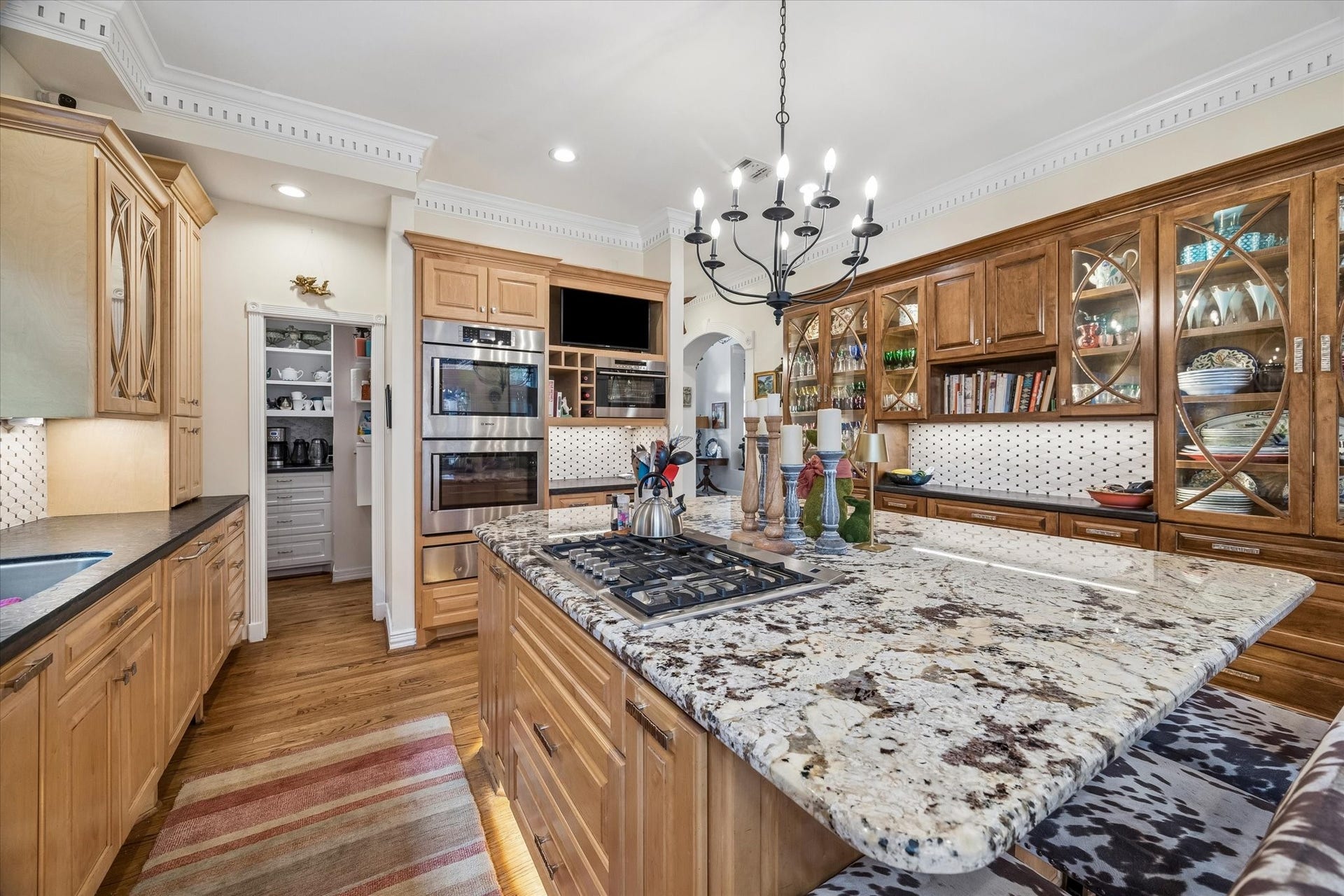 2120 Potomac Drive, #A, Houston, TX 77057 A large walk-in pantry complements the kitchen with space for a coffee or tea bar! Pantry also features lockable china/silver drawers, lazy Susan cabinet, and a broom cabinet.