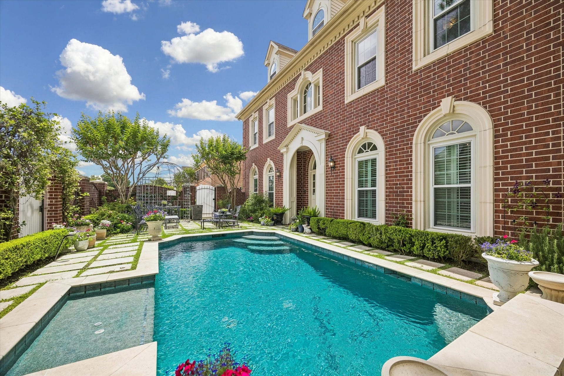 2120 Potomac Drive, #A, Houston, TX 77057 Absolutely gorgeous! The pool also features a bubbler shelf and seating below the fountain.