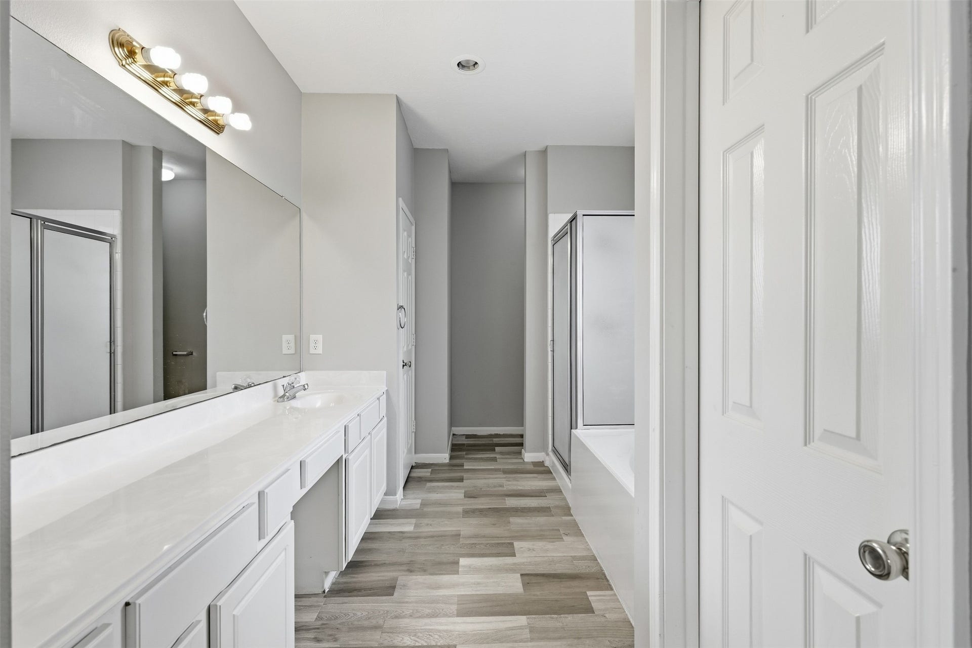 3003 Grey Mist Court, Friendswood, TX 77546 Primary bath featuring vanity and generous counter space.