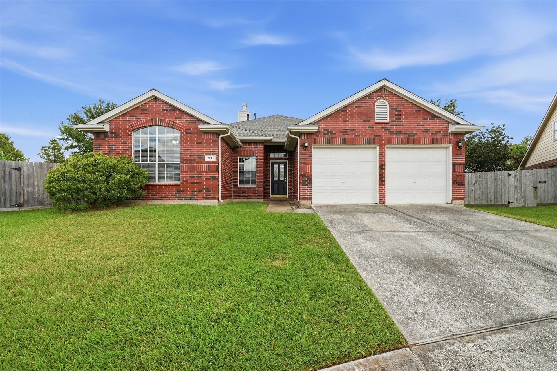3003 Grey Mist Court, Friendswood, TX 77546 Brick home situated on a cul-de-sac in the established Heritage Park community.
