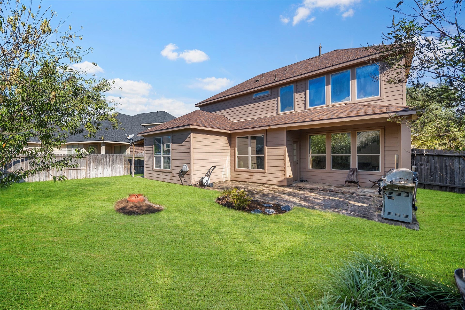 Note: The grass in this photo has been virtually enhanced to demonstrate the property's full potential.