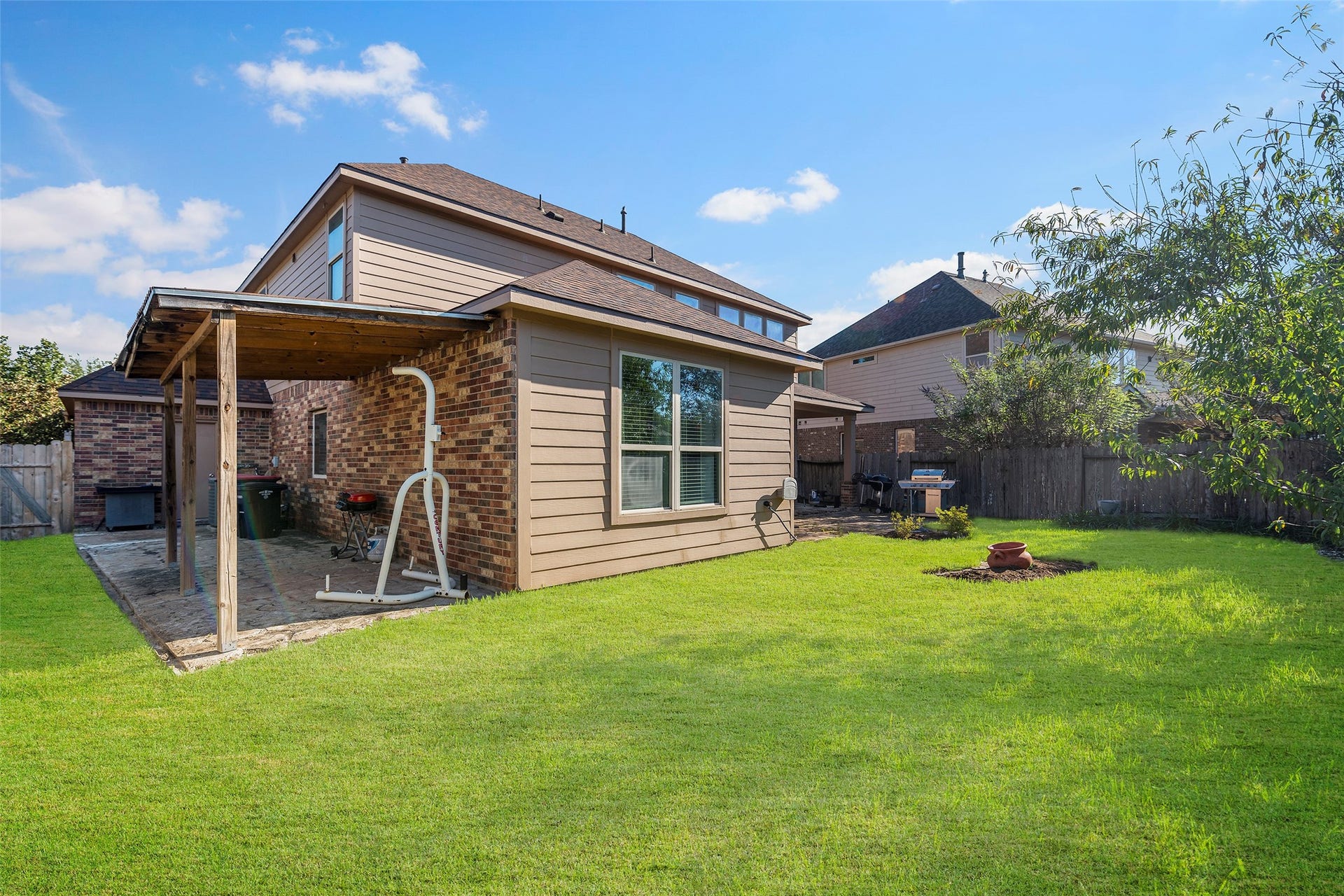 Note: The grass in this photo has been virtually enhanced to demonstrate the property's full potential.