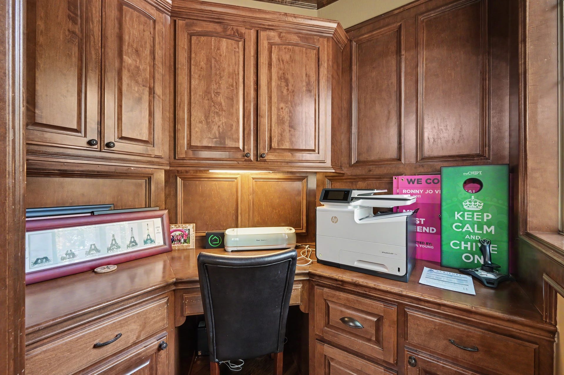 27706 Braydon Court, Spring, TX 77386 Home office nook with rich wooden cabinetry, ample storage, and a well-lit workspace perfect for productivity located inside the office/study/library.