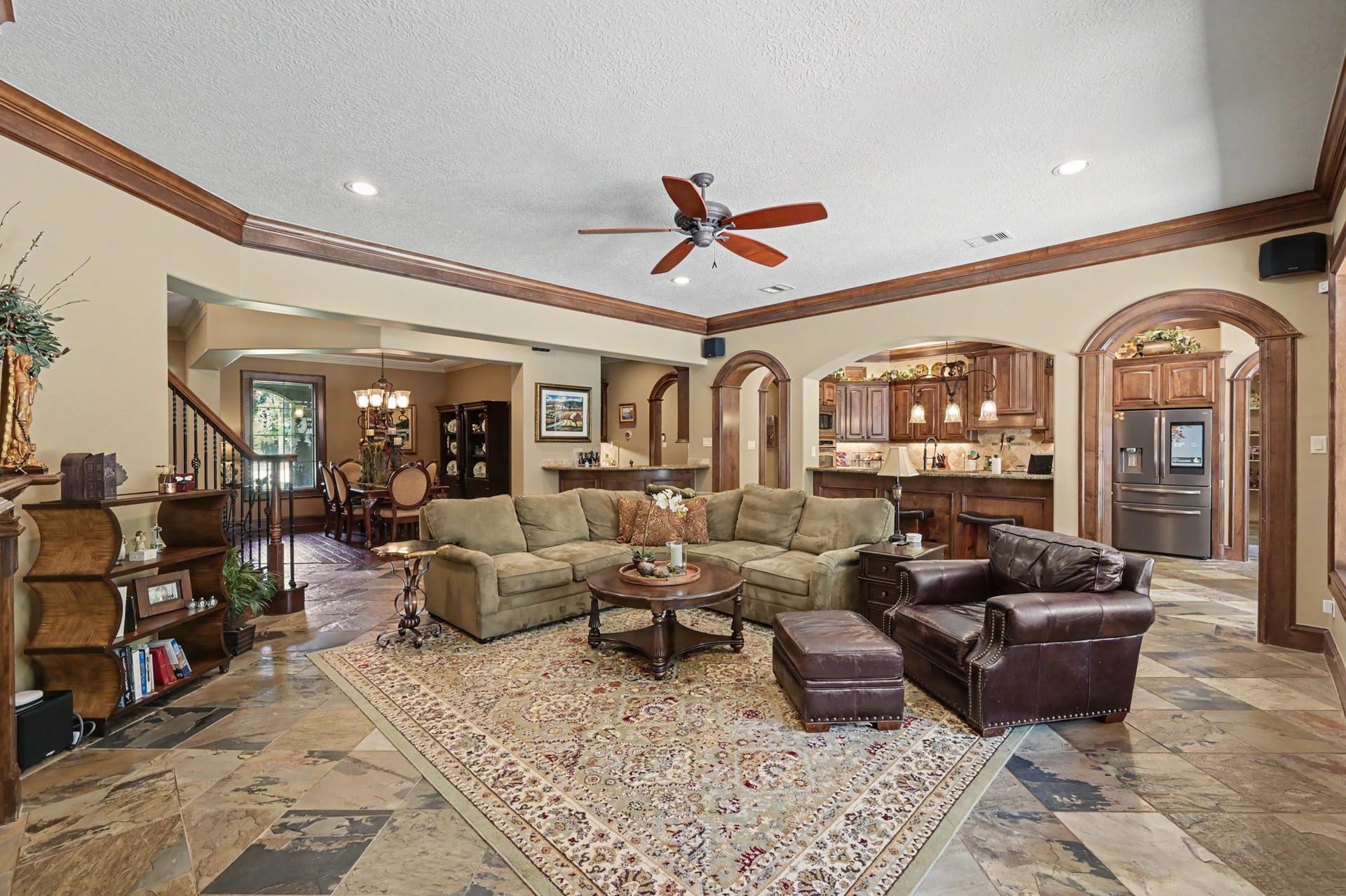 27706 Braydon Court, Spring, TX 77386 Open-concept family/living area seamlessly flows into a dining area and a kitchen is the epicenter of the home and an inviting space for entertaining.