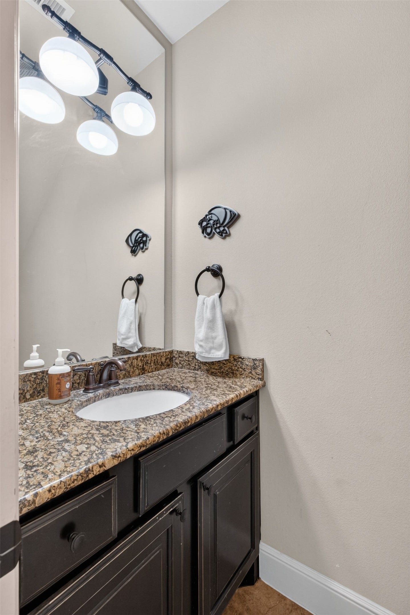 2806 Texas Laurel Drive, Katy, TX 77494 Elegant and convenient half bath downstairs with built in cabinets