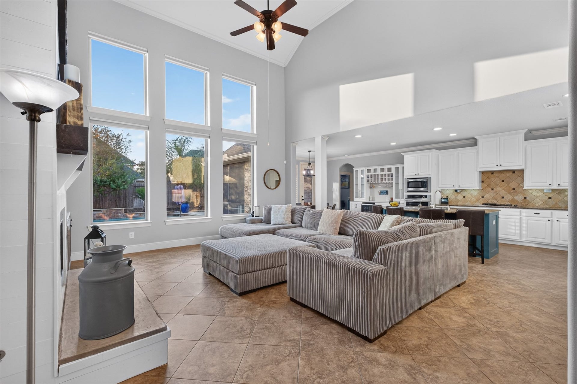 2806 Texas Laurel Drive, Katy, TX 77494 The open plan concept shows just how large this living room is. Natural light and views of the pool make this a fabulous entyertaining space