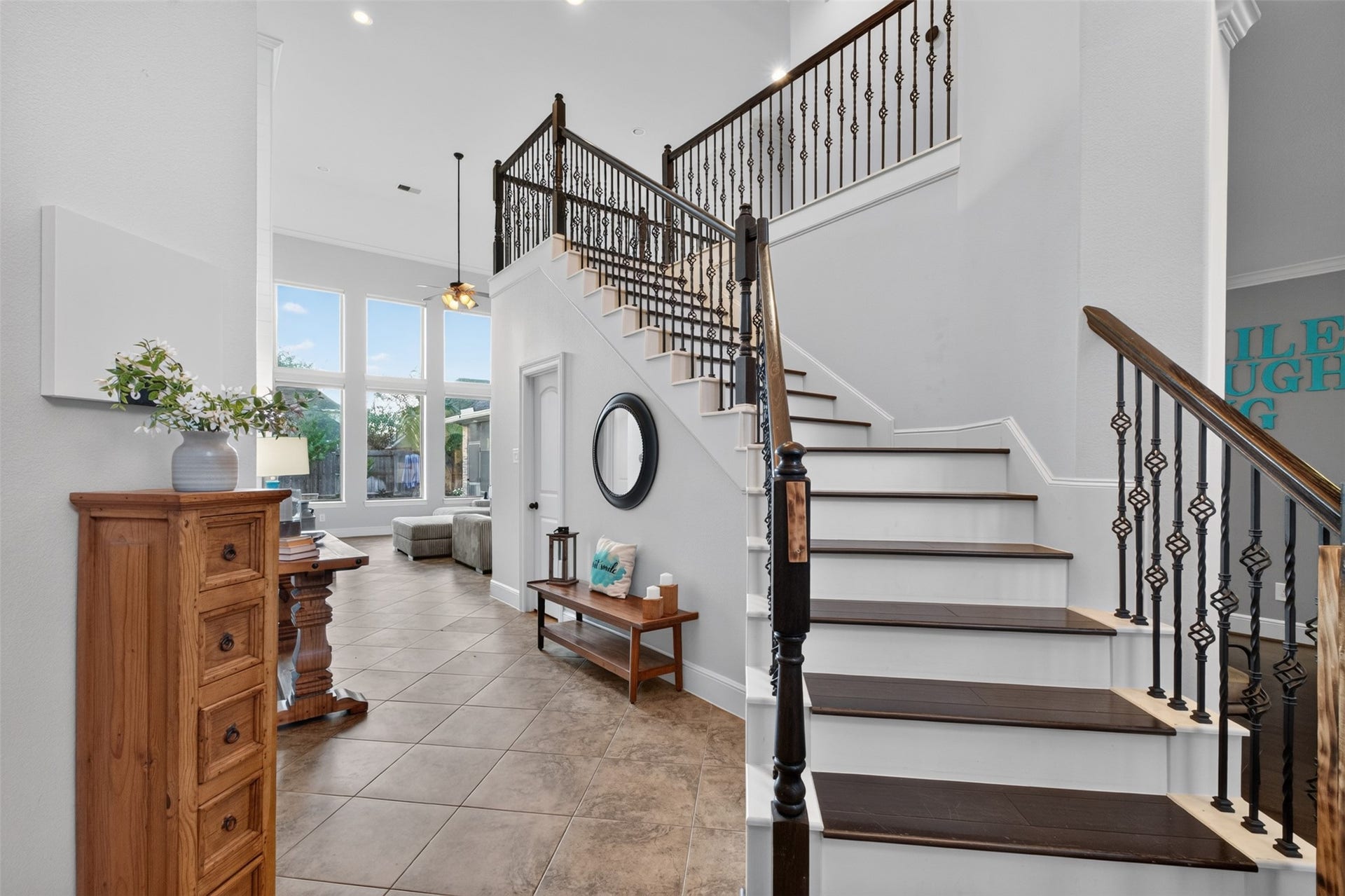 2806 Texas Laurel Drive, Katy, TX 77494 The homes double height ceilings and bay of windows provides fabulous natural light