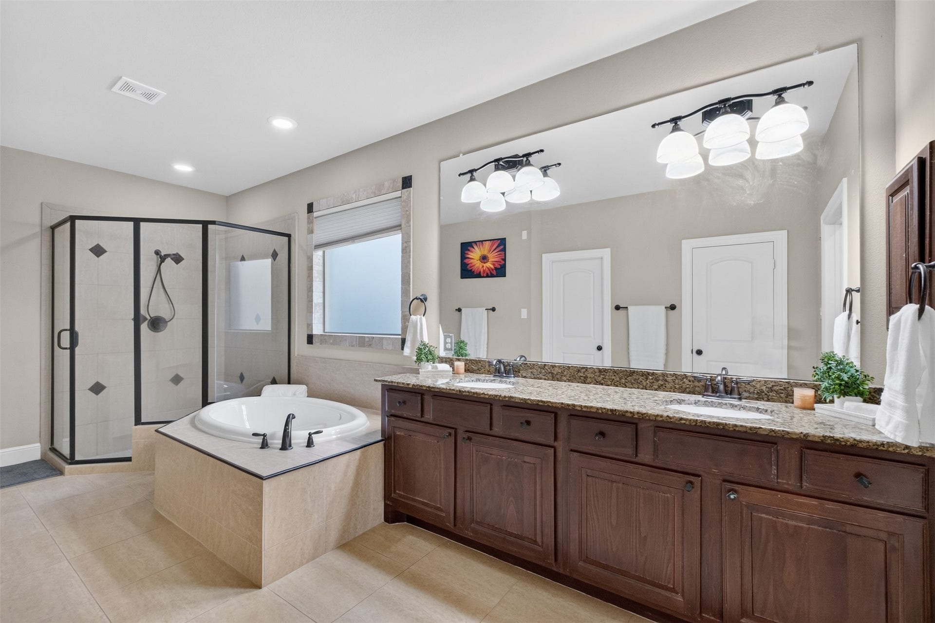 2806 Texas Laurel Drive, Katy, TX 77494 Double sinks, granite work tops, soaking bath and large separate shower in the primary ensuite