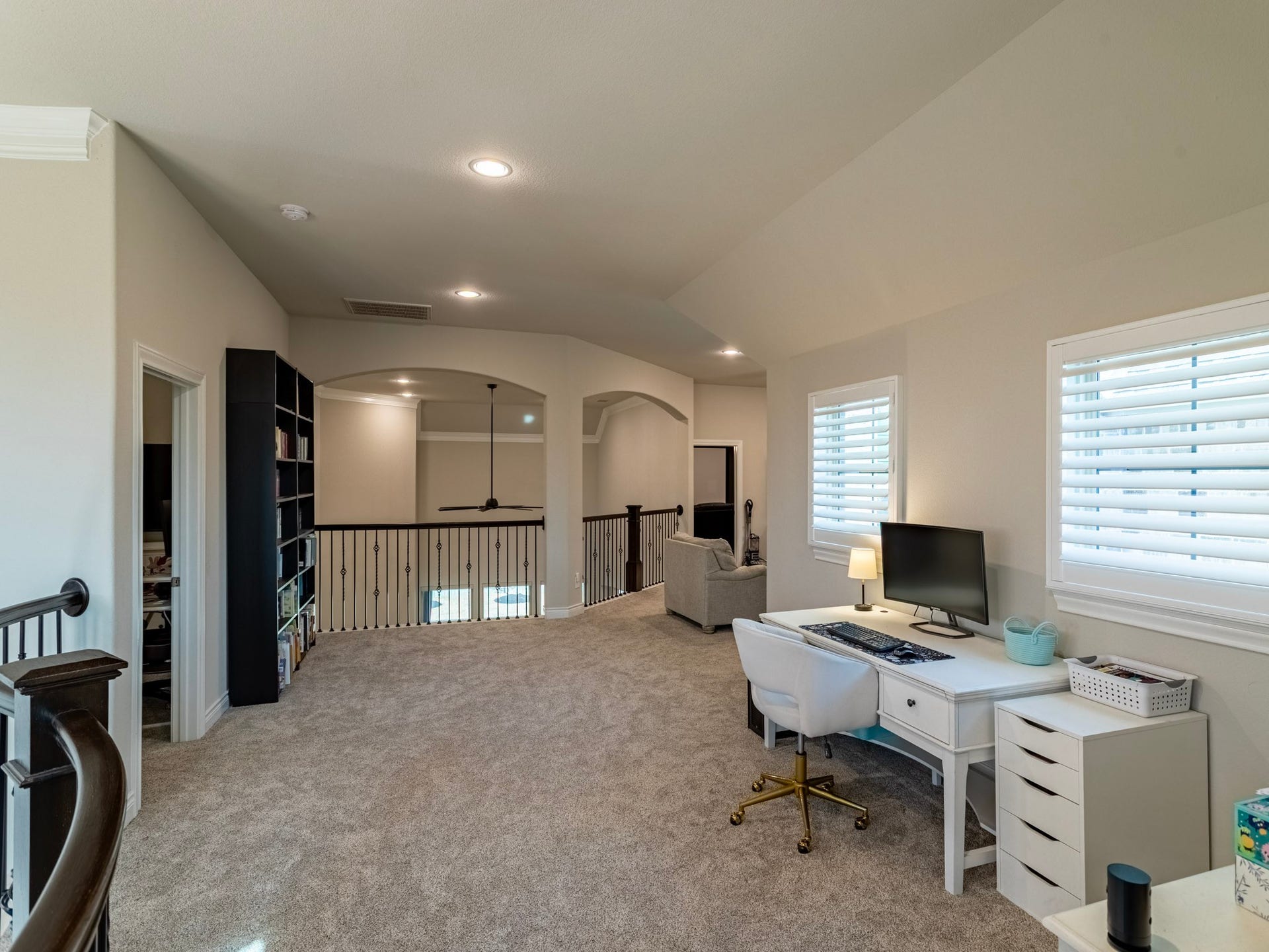 17429 Orchid Falls Lane, Conroe, TX 77302 Extra room at the top of the stairs perfect for homework station or second office. Second guest suite to the left, game room, media and 2 more bedrooms to the right