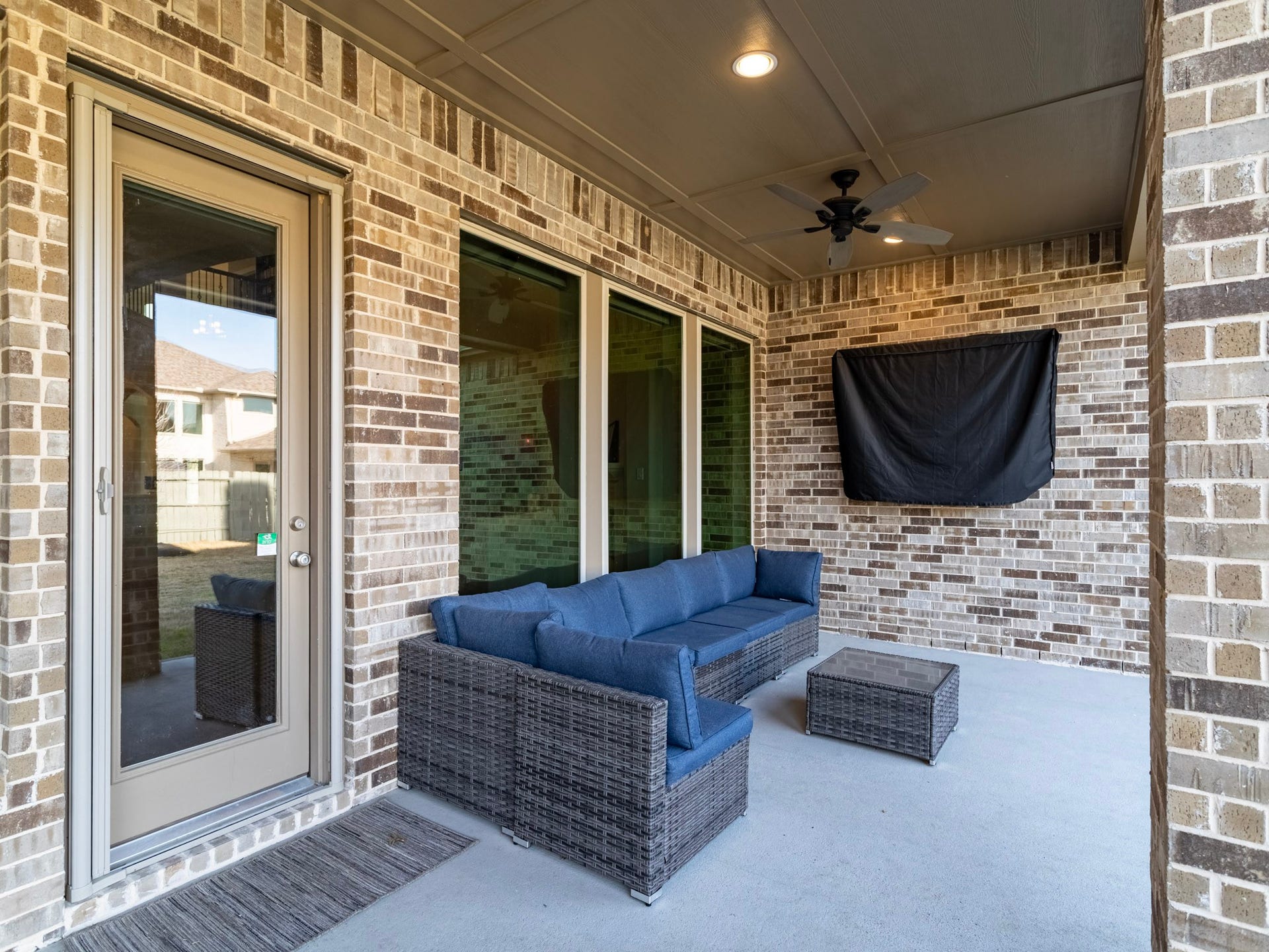 17429 Orchid Falls Lane, Conroe, TX 77302 Extended back patio with fans