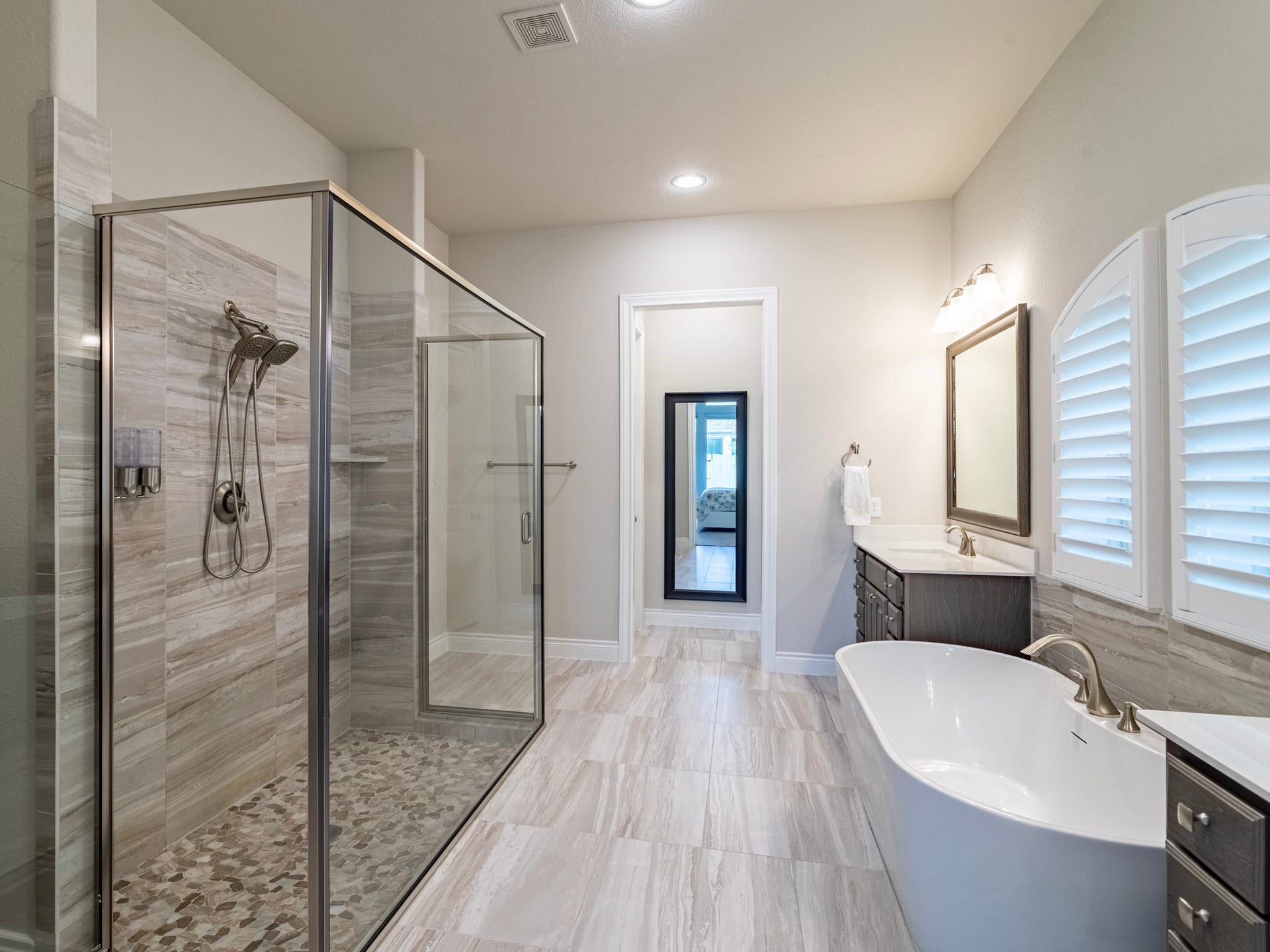 17429 Orchid Falls Lane, Conroe, TX 77302 Primary bath with soaking tub and extended shower