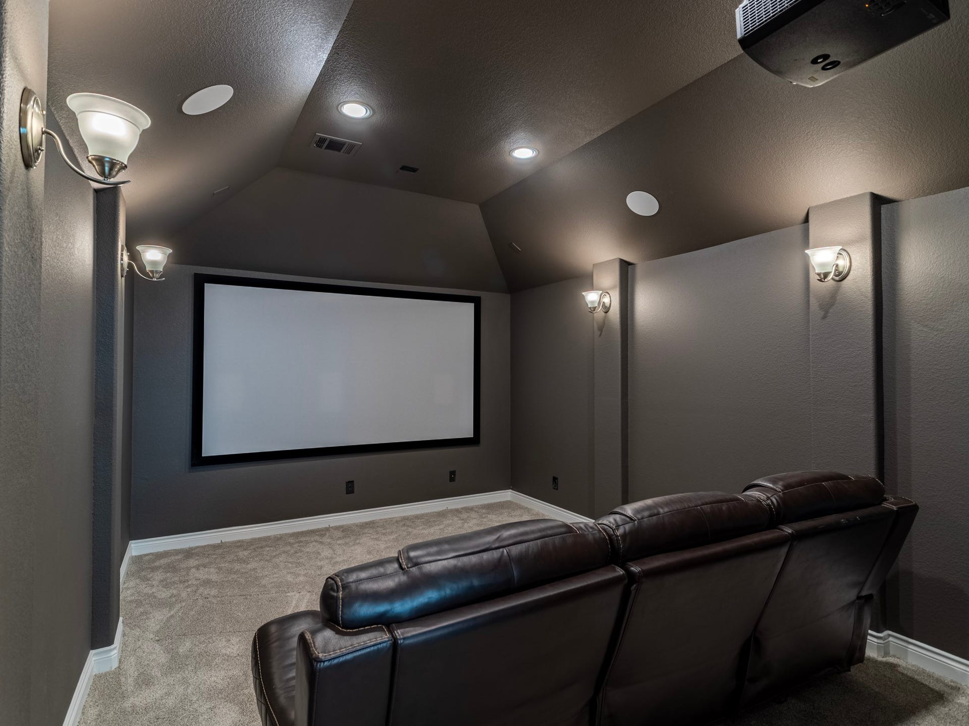 17429 Orchid Falls Lane, Conroe, TX 77302 Media room with projector and amazing surround sound system