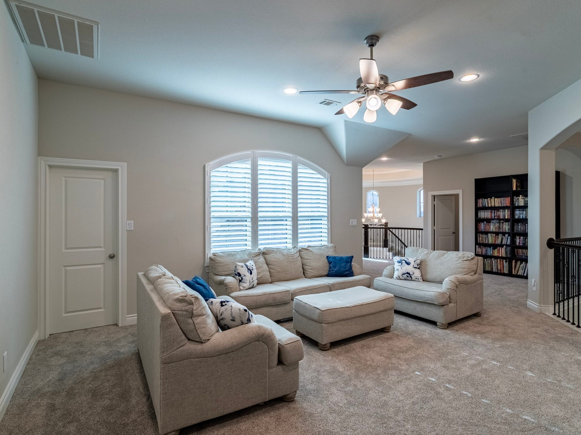 17429 Orchid Falls Lane, Conroe, TX 77302 Game room closet on the left, on the right secondary suite and rotunda stairway.