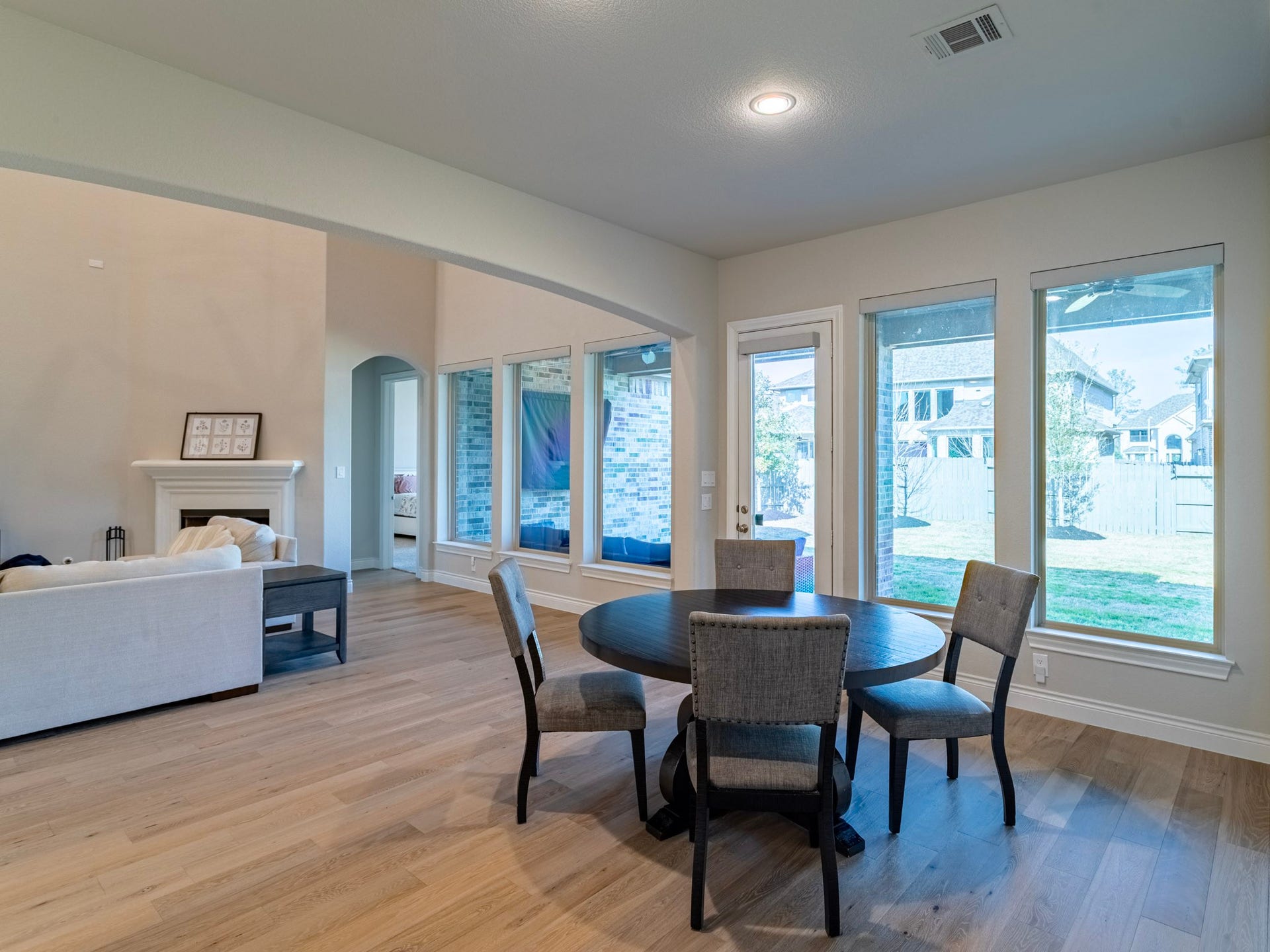 17429 Orchid Falls Lane, Conroe, TX 77302 Dining opens to extended back patio