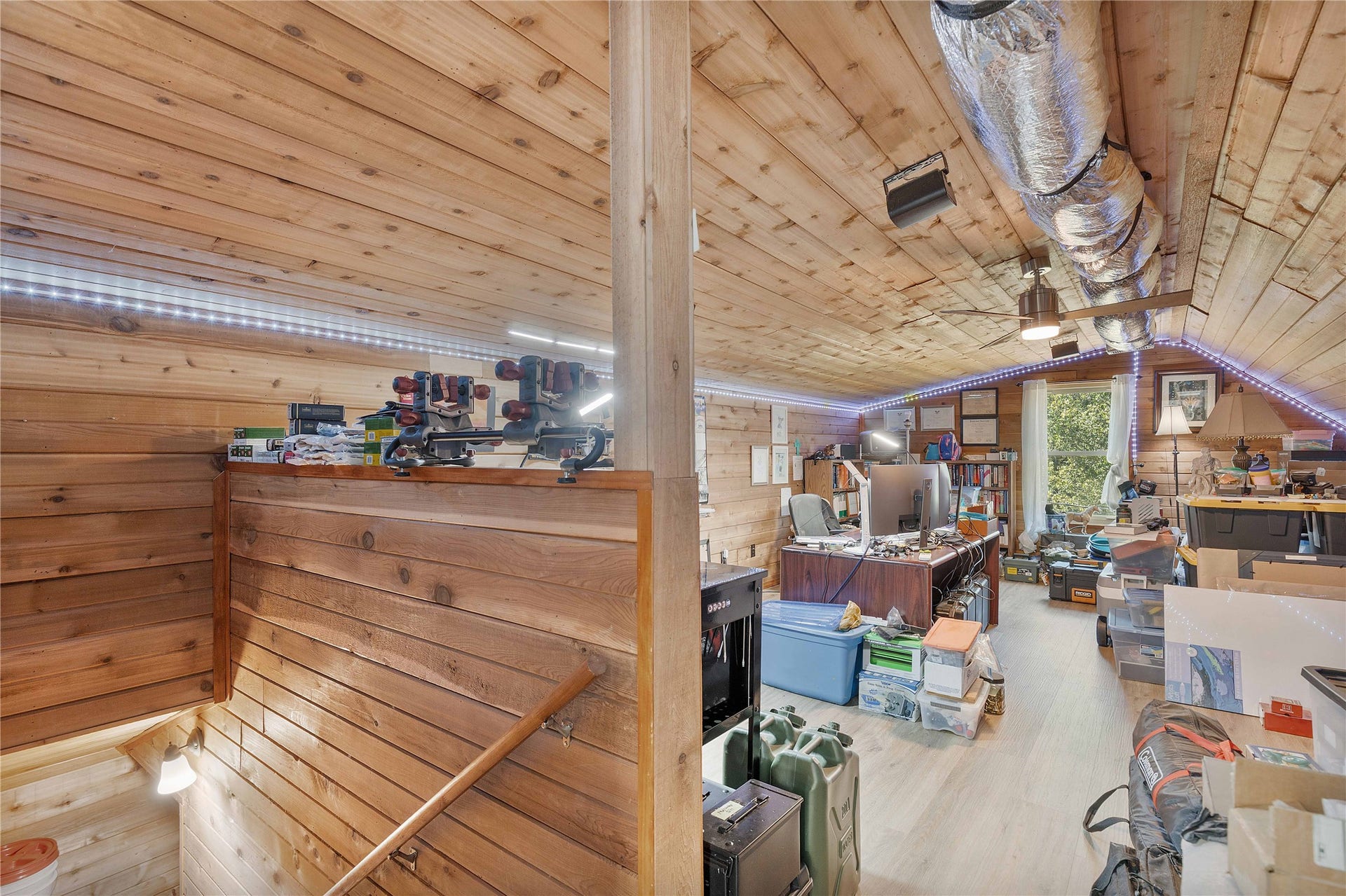 Flex room that can be used as a 4th bedroom/office/game room/garage apartment.  Stairway leads to the garage and half bathroom in the garage.