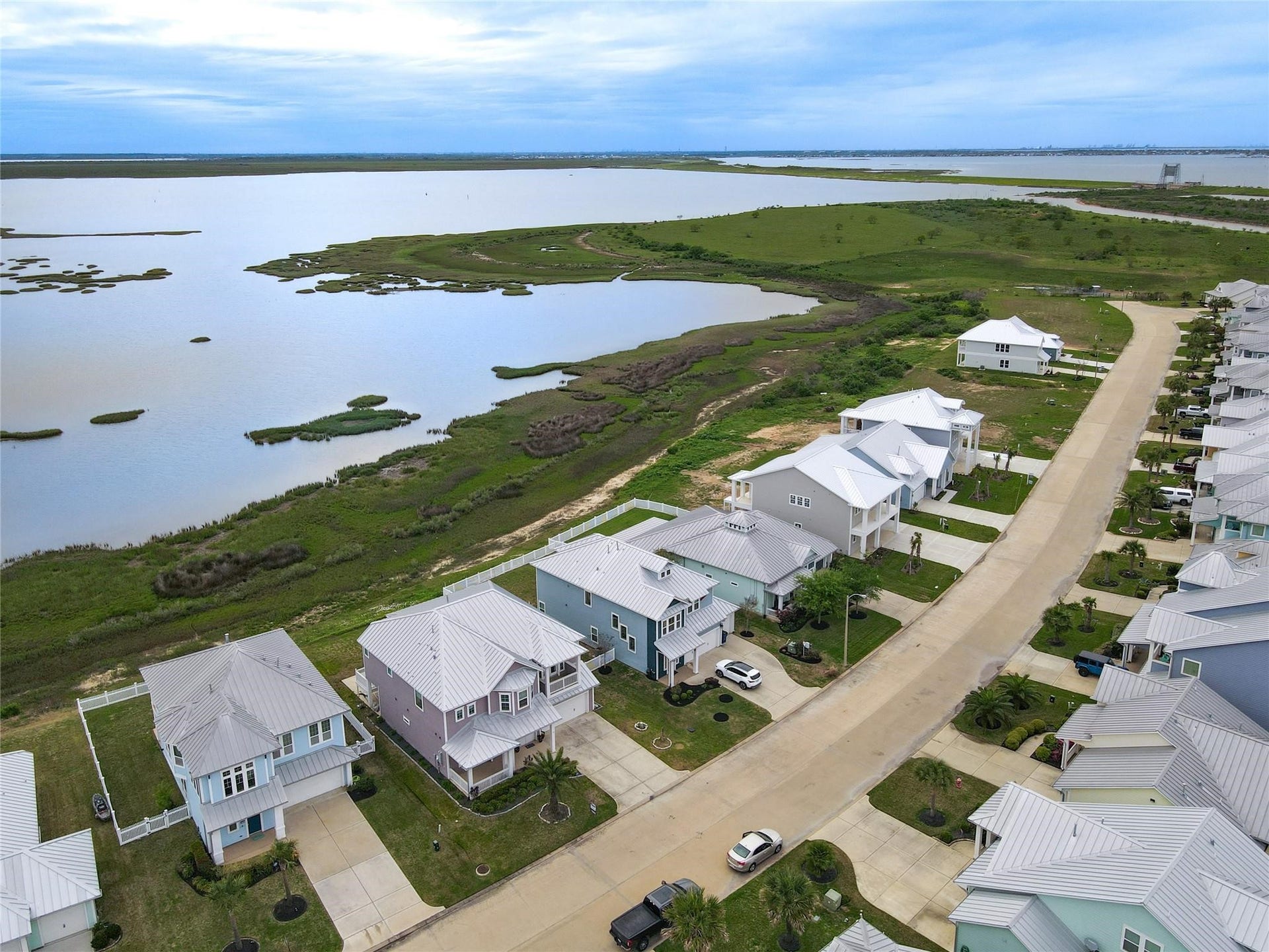 5126 Allen Cay Drive, Texas City, TX 77590 This charming waterfront community with modern homes offer stunning views of the expansive bay and serene natural surroundings.