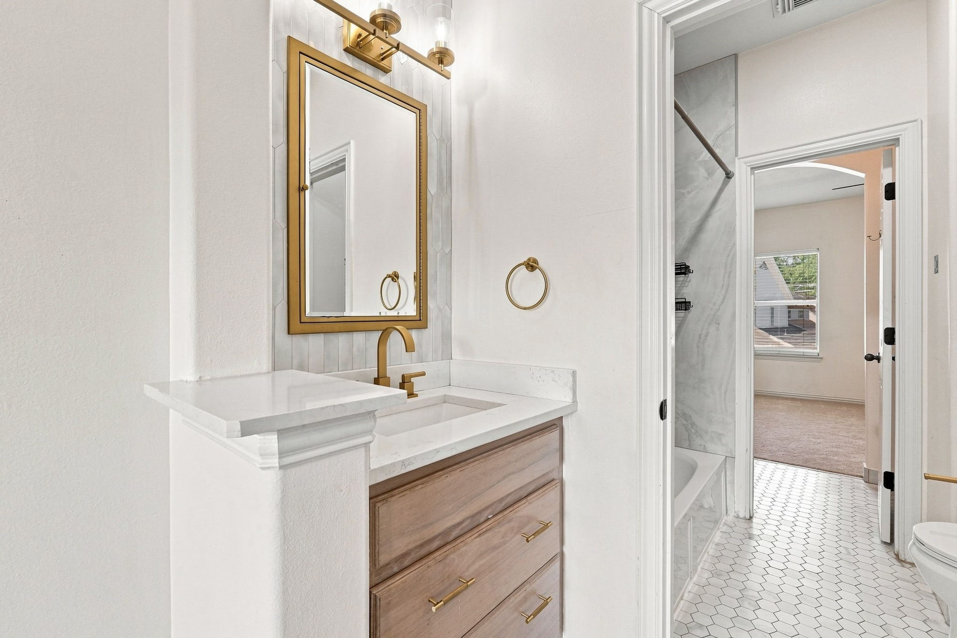 11510 Cypresswood Trail Drive, Houston, TX 77070 Updated Jack and Jill bathroom connecting secondary bedroom #2 and #3