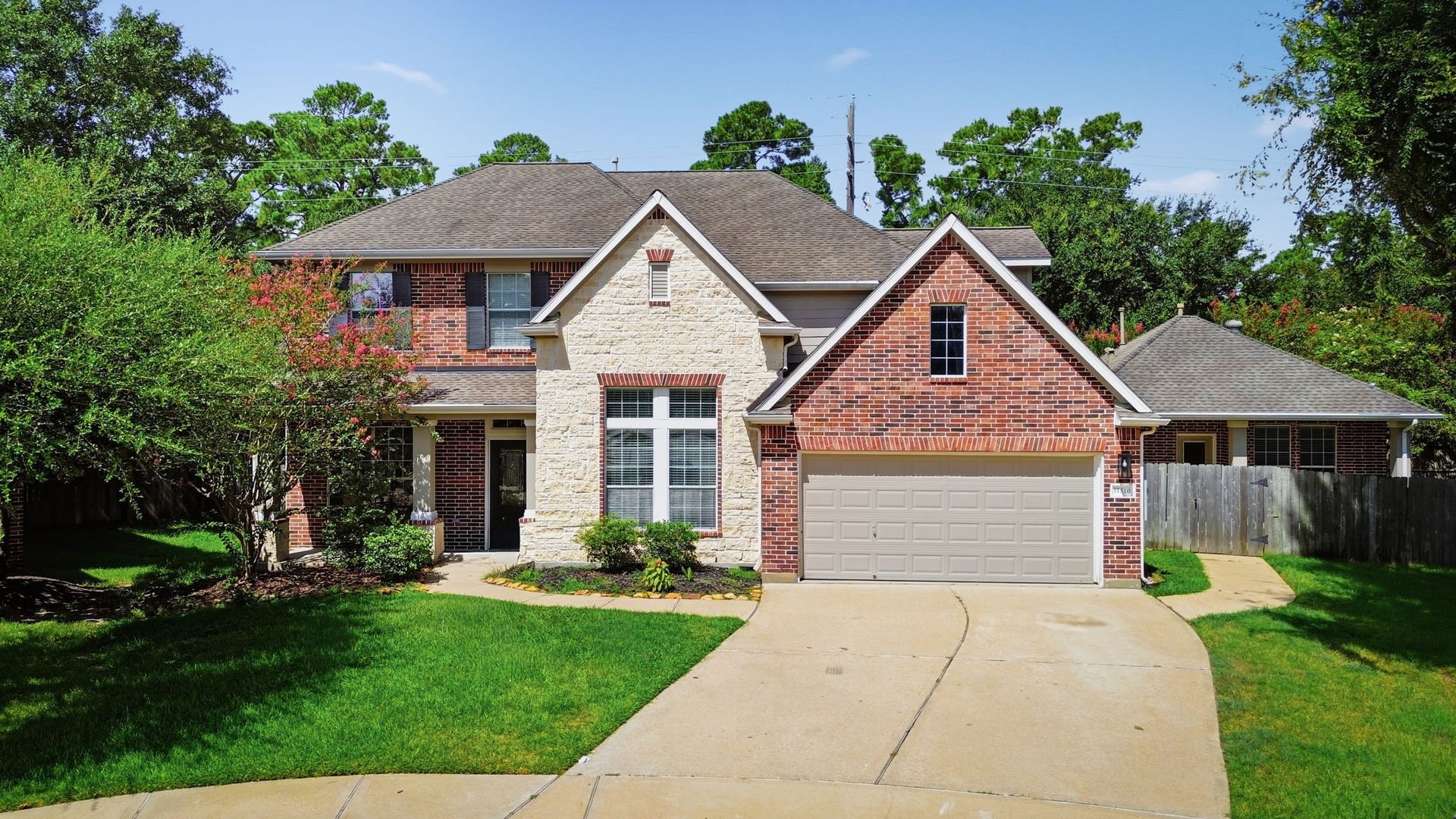 11510 Cypresswood Trail Drive, Houston, TX 77070 Main home with casita behind the fence on the right hand side.