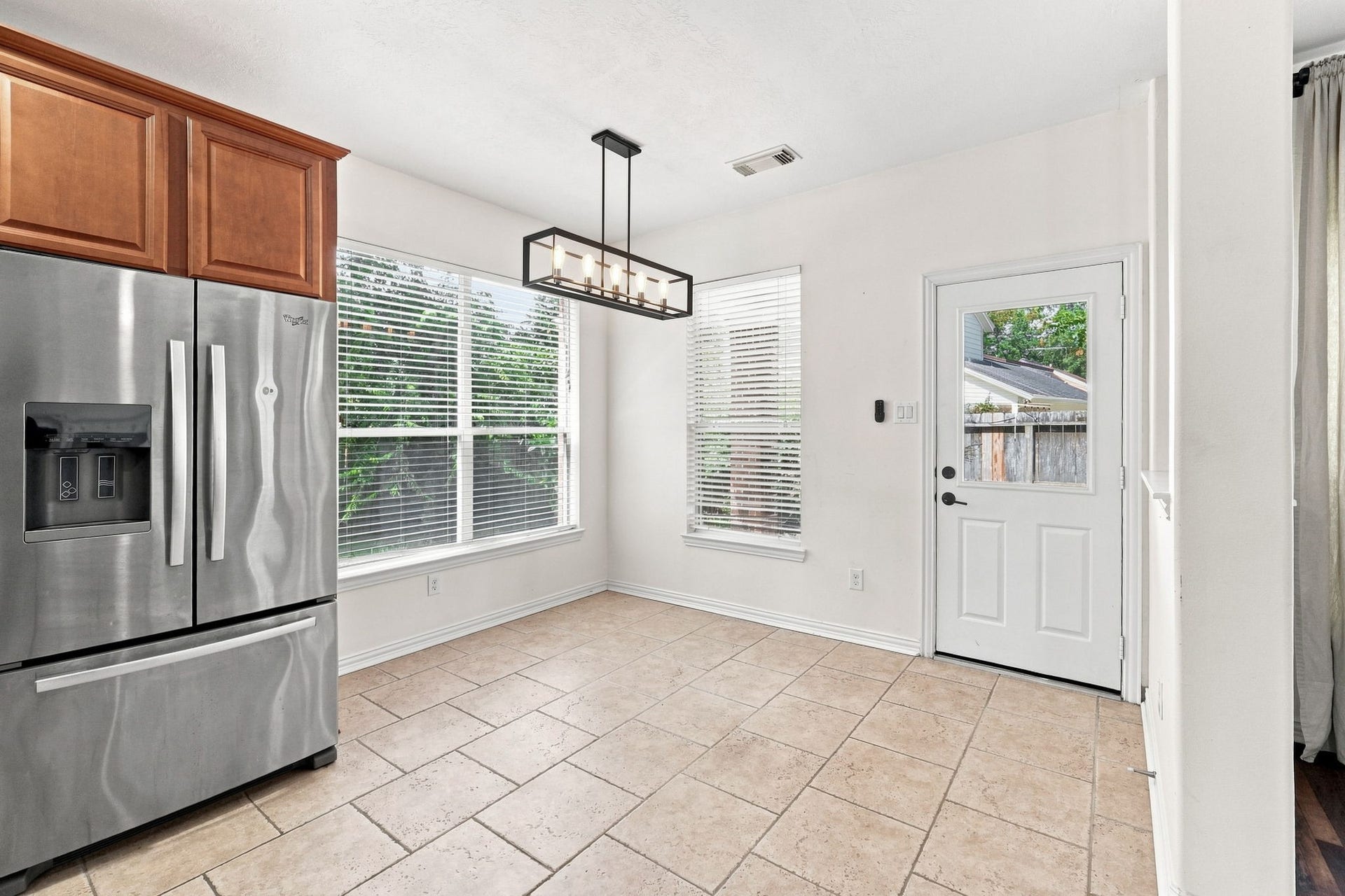 11510 Cypresswood Trail Drive, Houston, TX 77070 Breakfast area and door leading to the backyar