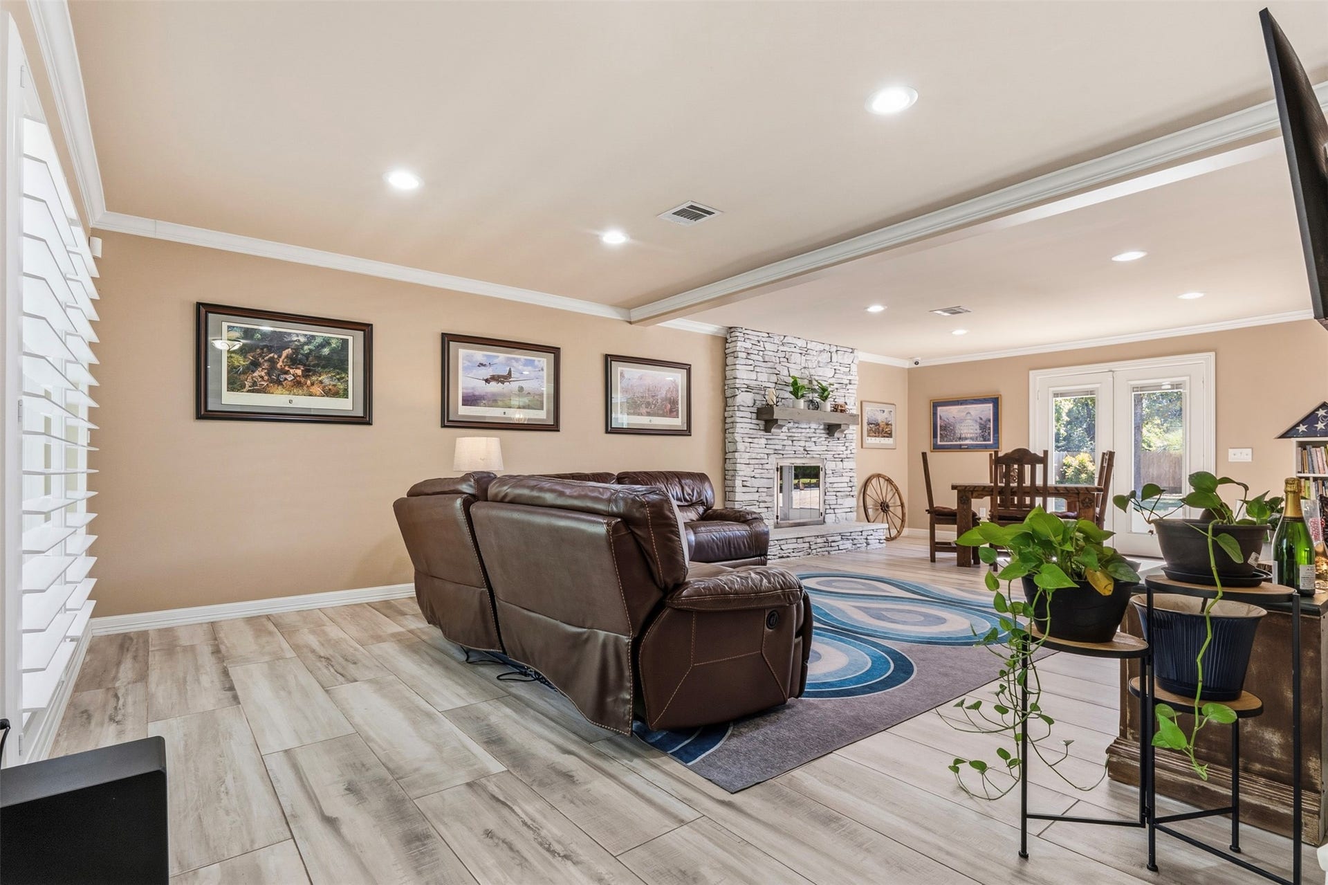 109 Riverbrook Drive, Conroe, TX 77385 Wood-like tile throughout the downstairs