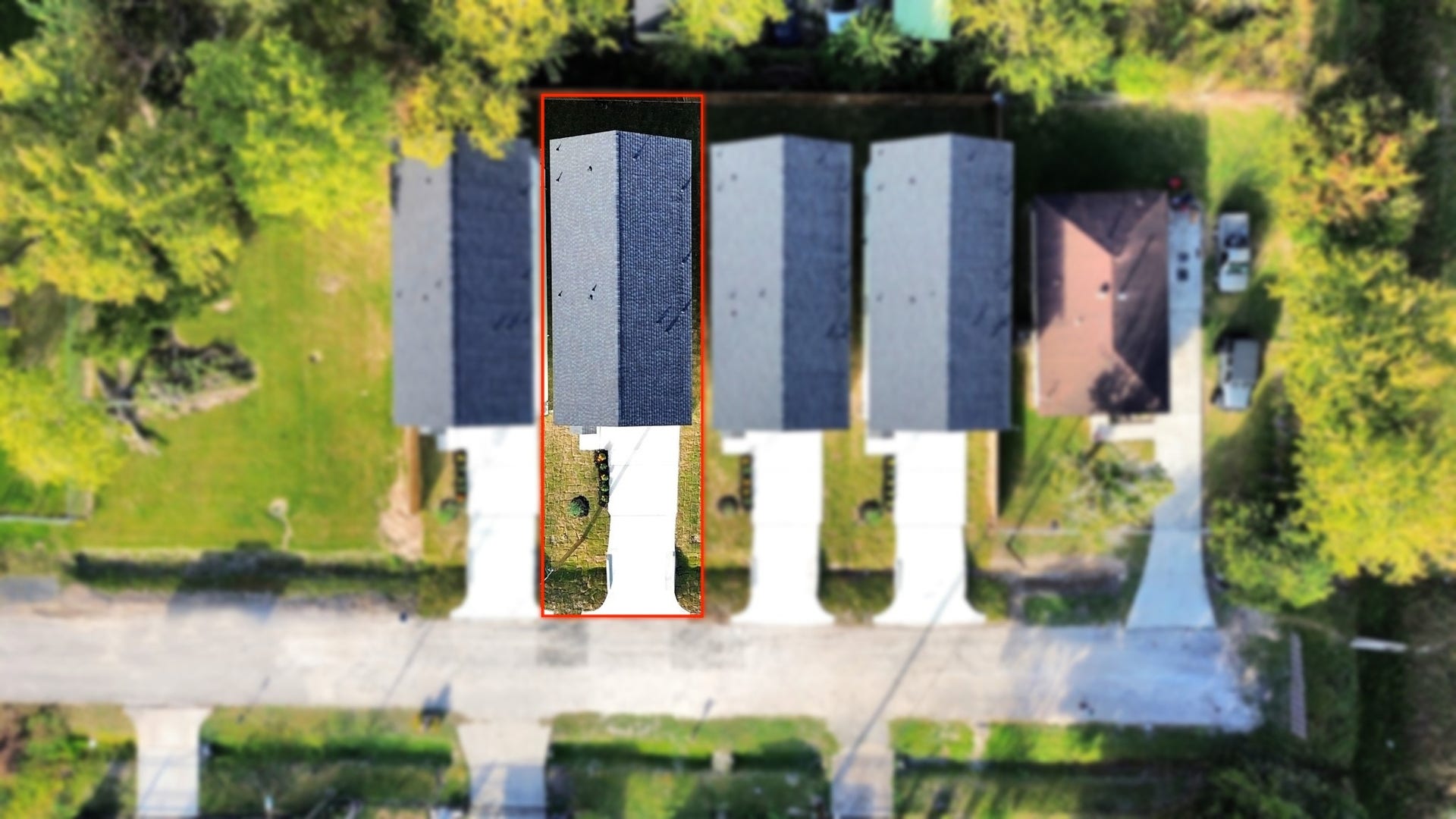 6673 Nielan Street, Houston, TX 77028 Overhead aerial view showcasing the four newly completed homes at 6671, 6673, 6675 & 6677 Nielan St, highlighting their matching architectural designs, individual driveways & property layouts.
