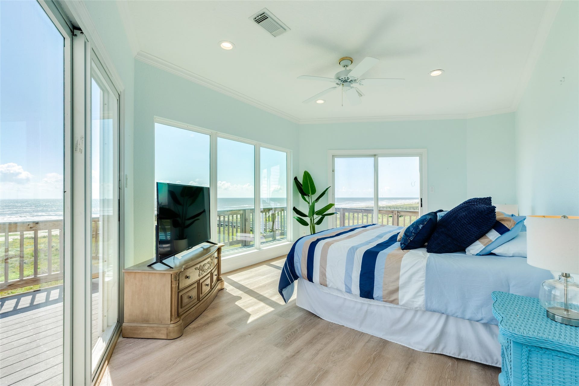 20911 W Sand Hill Drive, Galveston, TX 77554 Primary Bedroom upstairs has a wall of windows for 180 degree views of the Beach