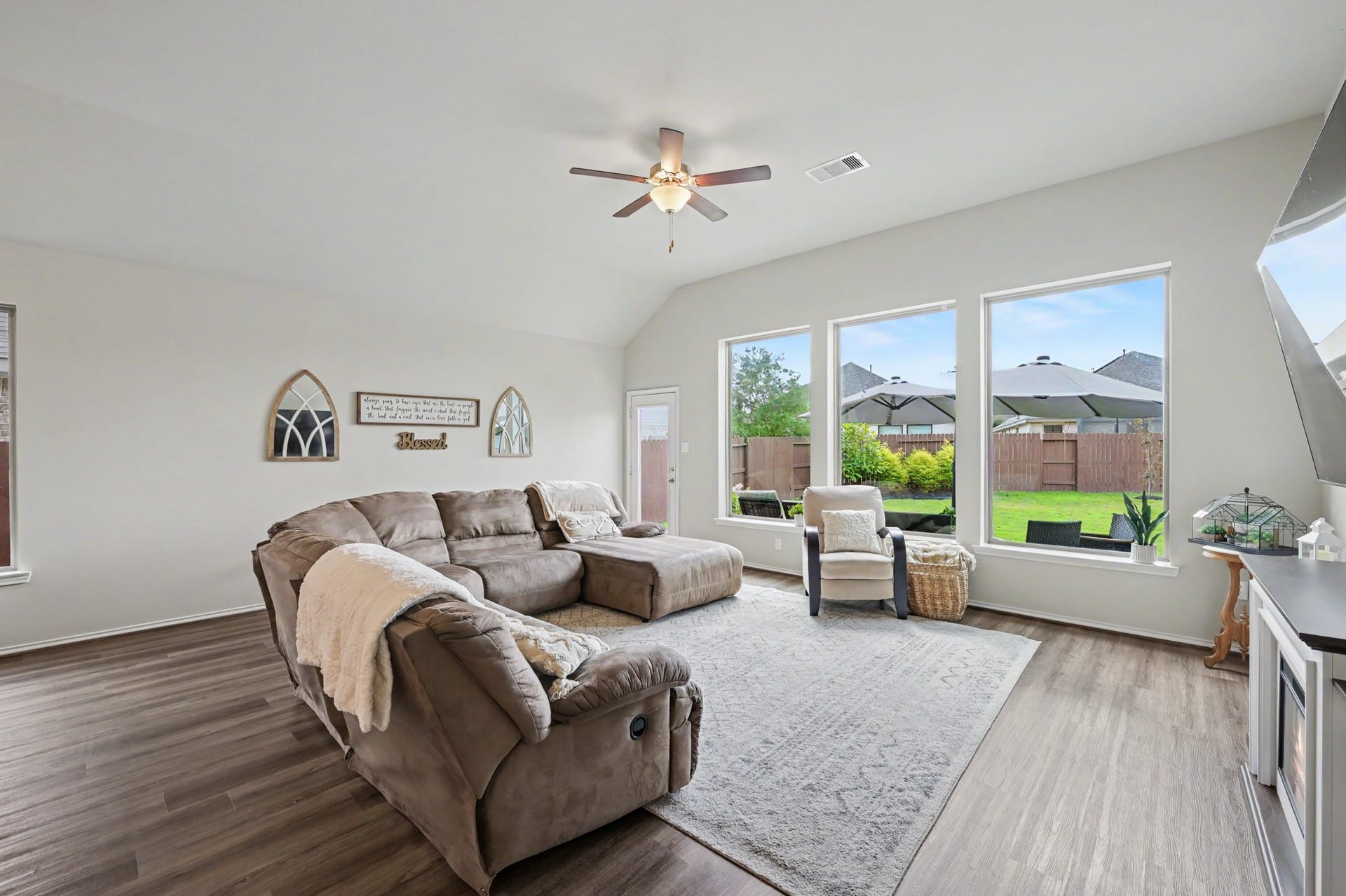 32034 August Woods Way, Conroe, TX 77385 Family room is immersed with natural light