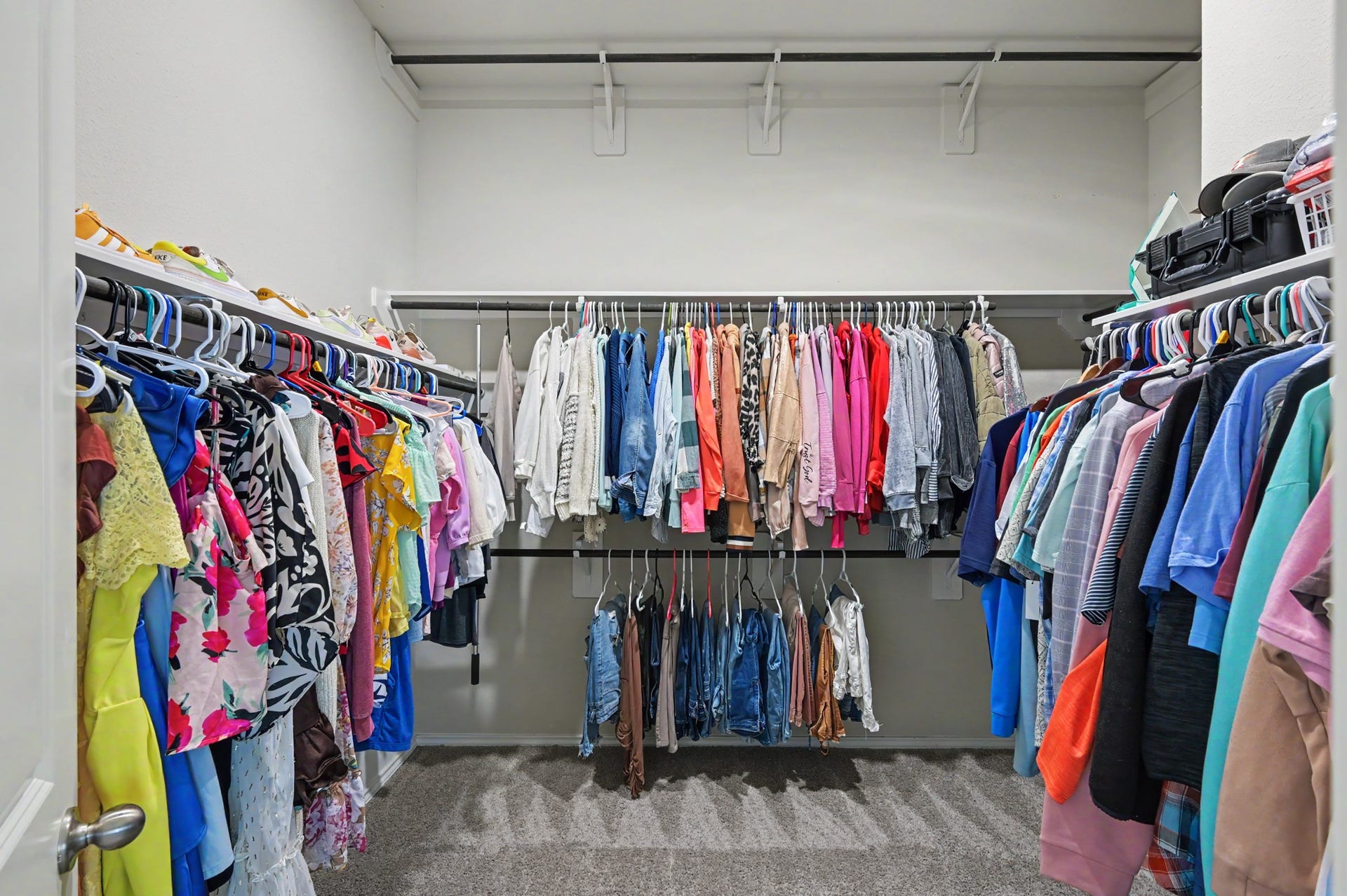 32034 August Woods Way, Conroe, TX 77385 Large walk-in closet w/ plenty of room for large wardrobes and shoe collections