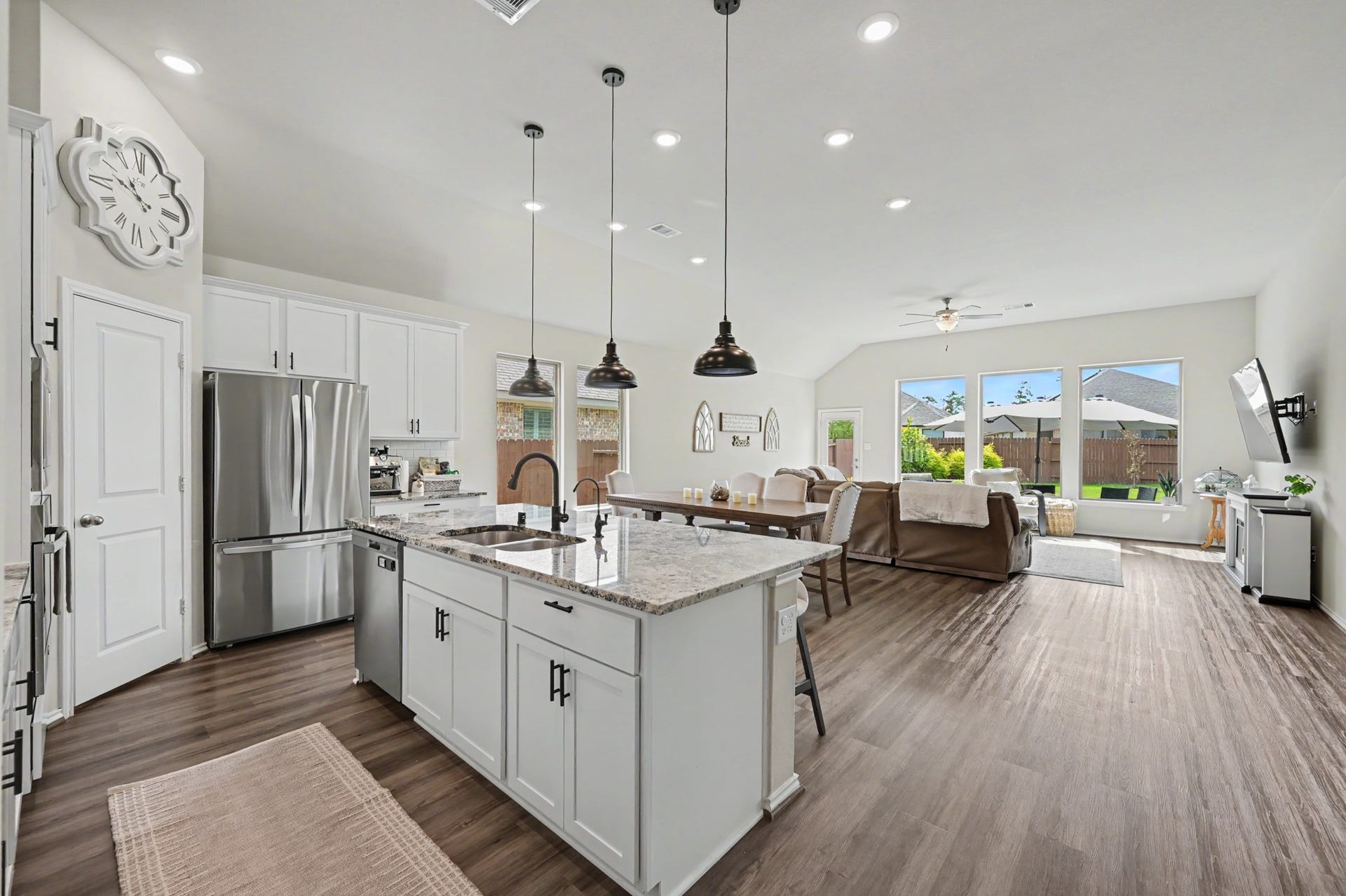 32034 August Woods Way, Conroe, TX 77385 Kitchen opens to family room and dining/ breakfast area. Perfect for entertaining