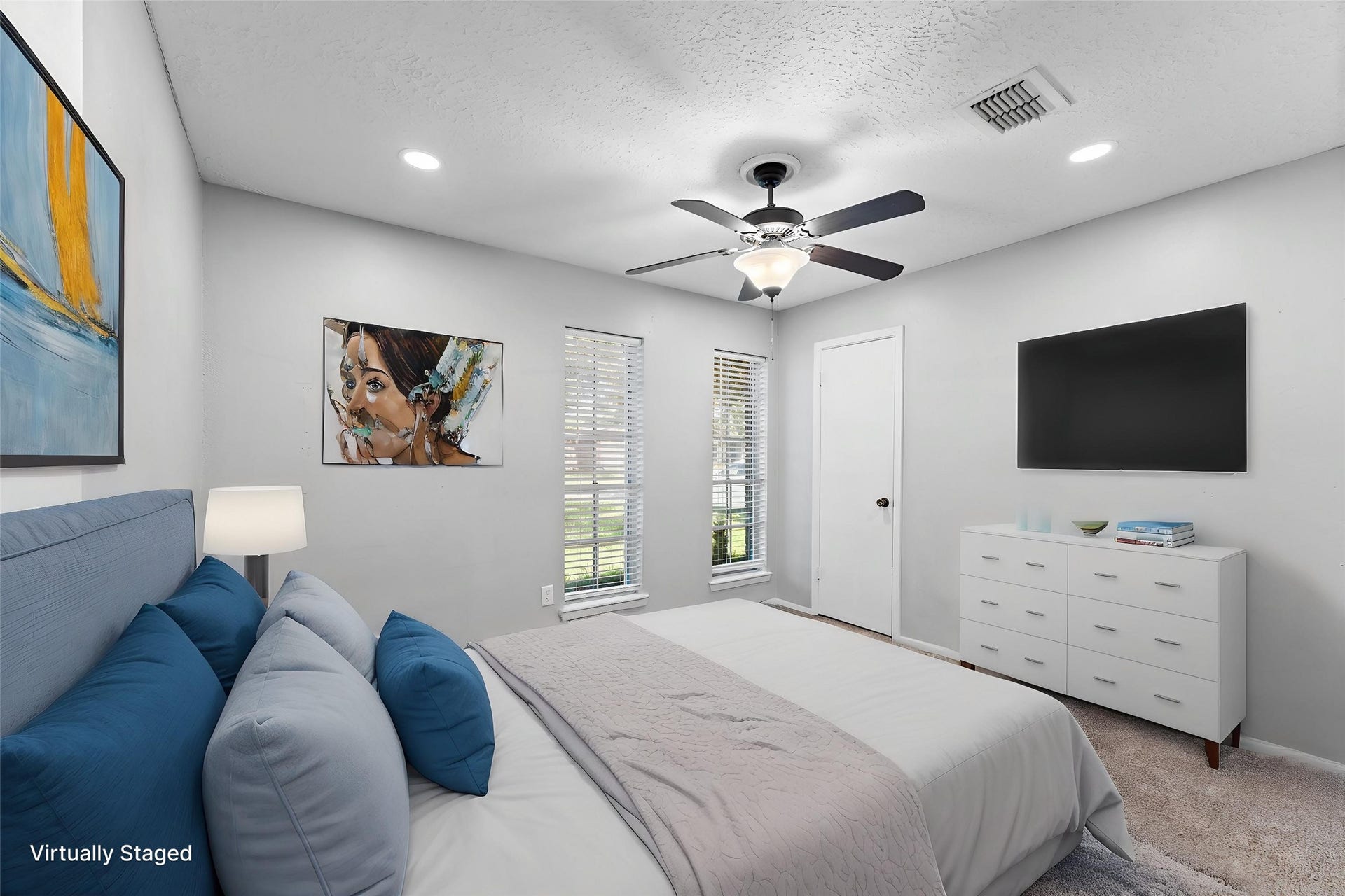 11227 Verlaine Drive, Houston, TX 77065 Bedroom 1 offers recessed lighting, plush carpet and a walk-in closet.