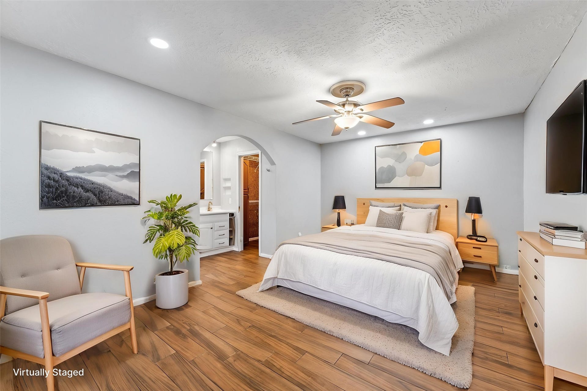 11227 Verlaine Drive, Houston, TX 77065 The primary suite features tile plank flooring, recessed lighting, and walk-in closet.
