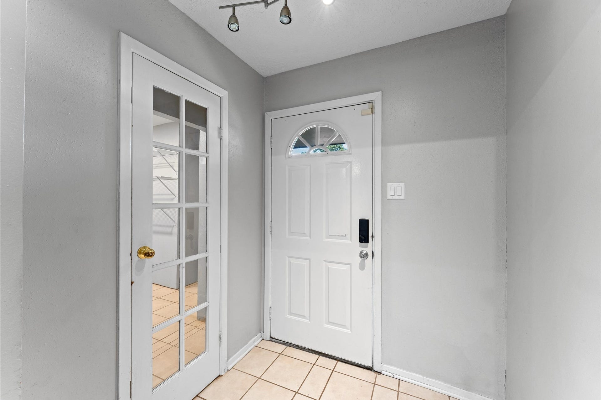 11227 Verlaine Drive, Houston, TX 77065 As you step inside, to the right you'll see a doorway that leads to a large laundry room as well as an added flex space or additional bedroom.
