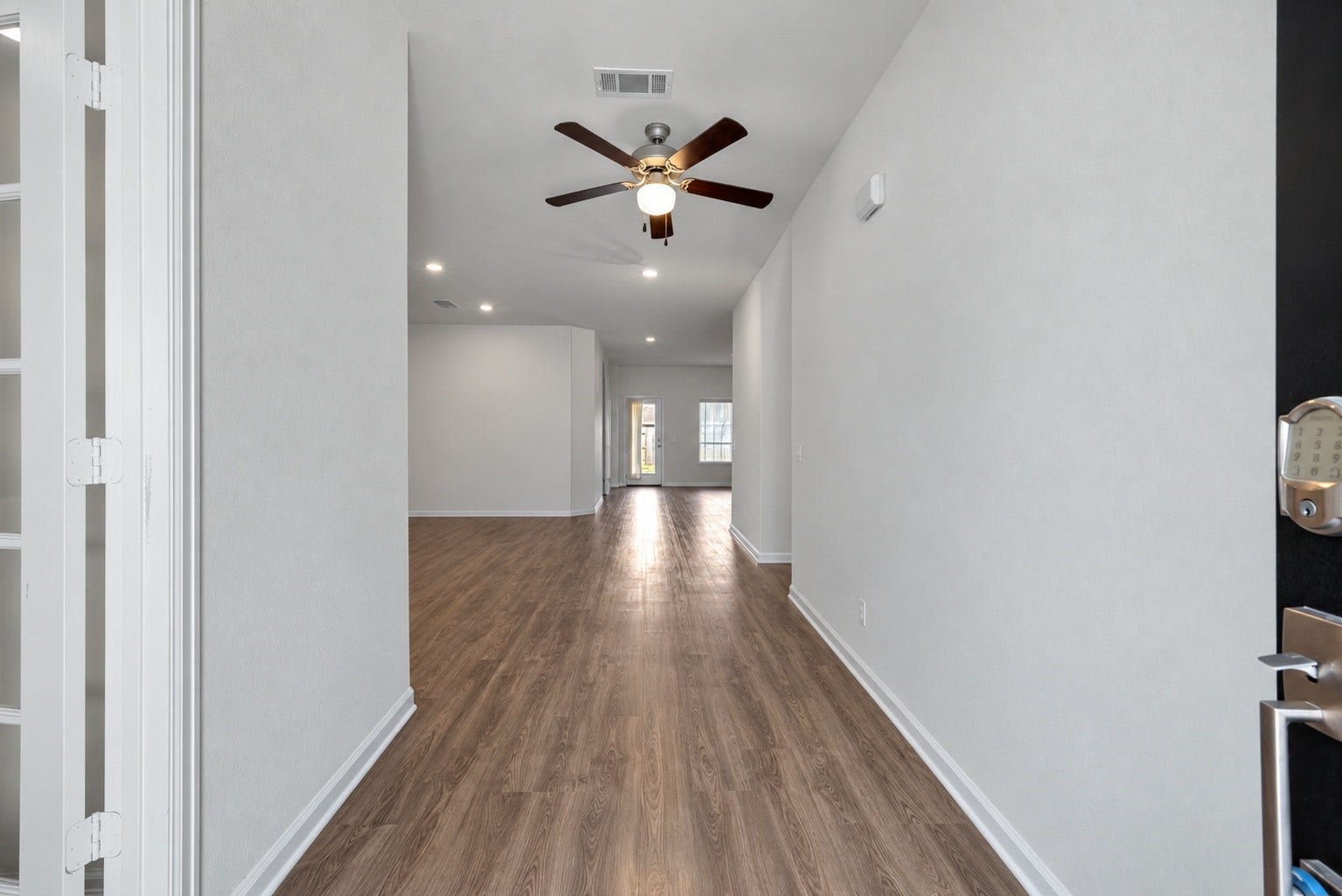 17342 Silver Birch Court, New Caney, TX 77357 Entry virtually staged without furniture.