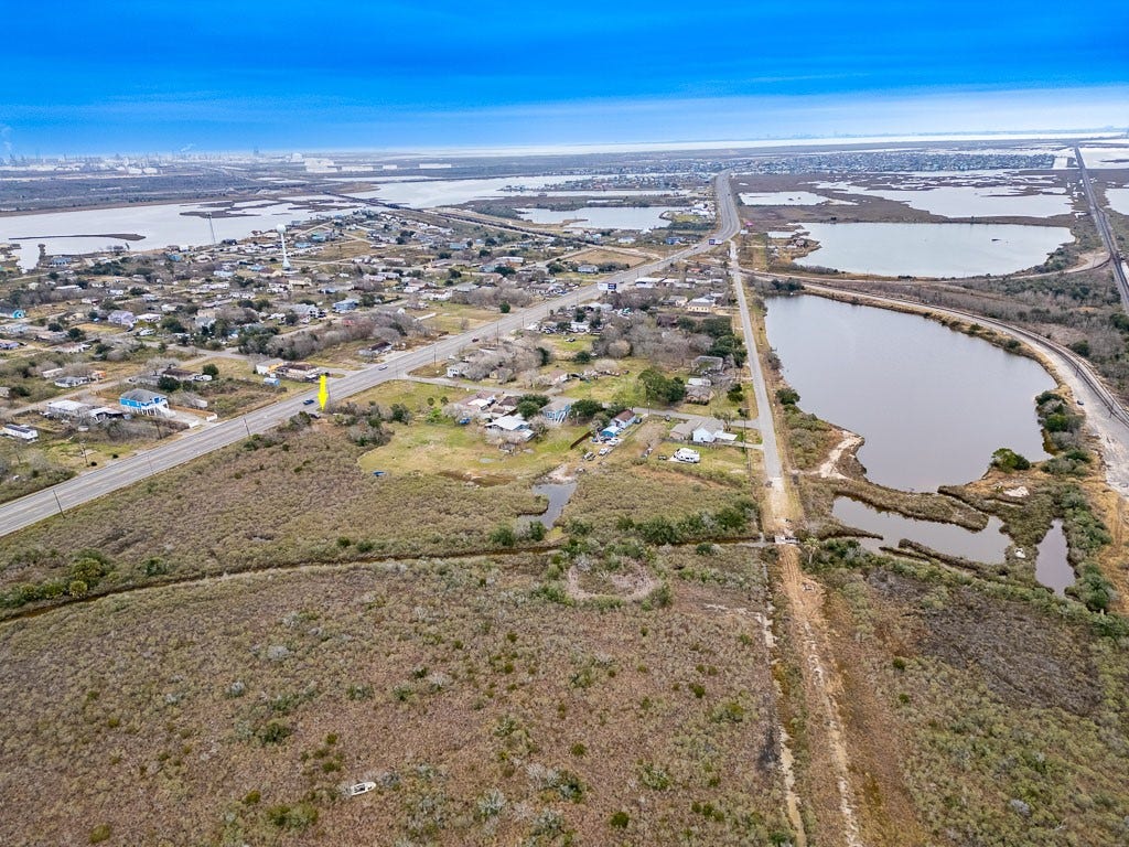 4811 Highway 6, Hitchcock, TX 77563 Regional aerial view with arrow identifying the property and illustrating its location along the Highway 6 corridor.