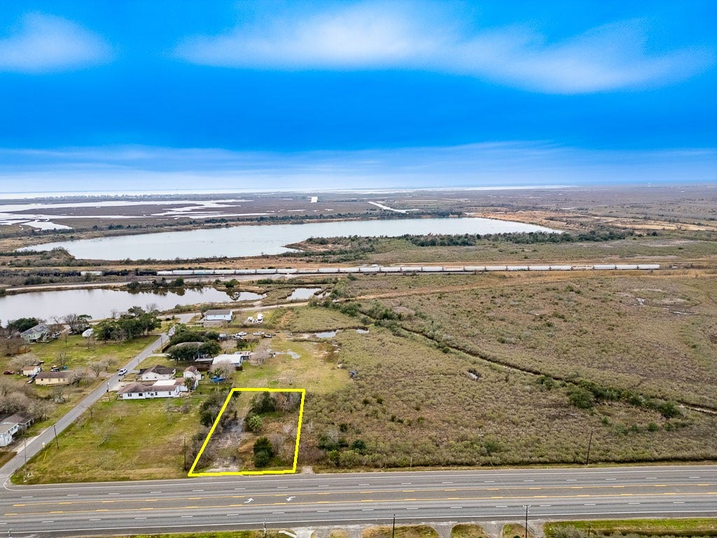 4811 Highway 6, Hitchcock, TX 77563 Aerial view highlighting the approximate property boundaries and approximately 100 feet of Highway 6 frontage.