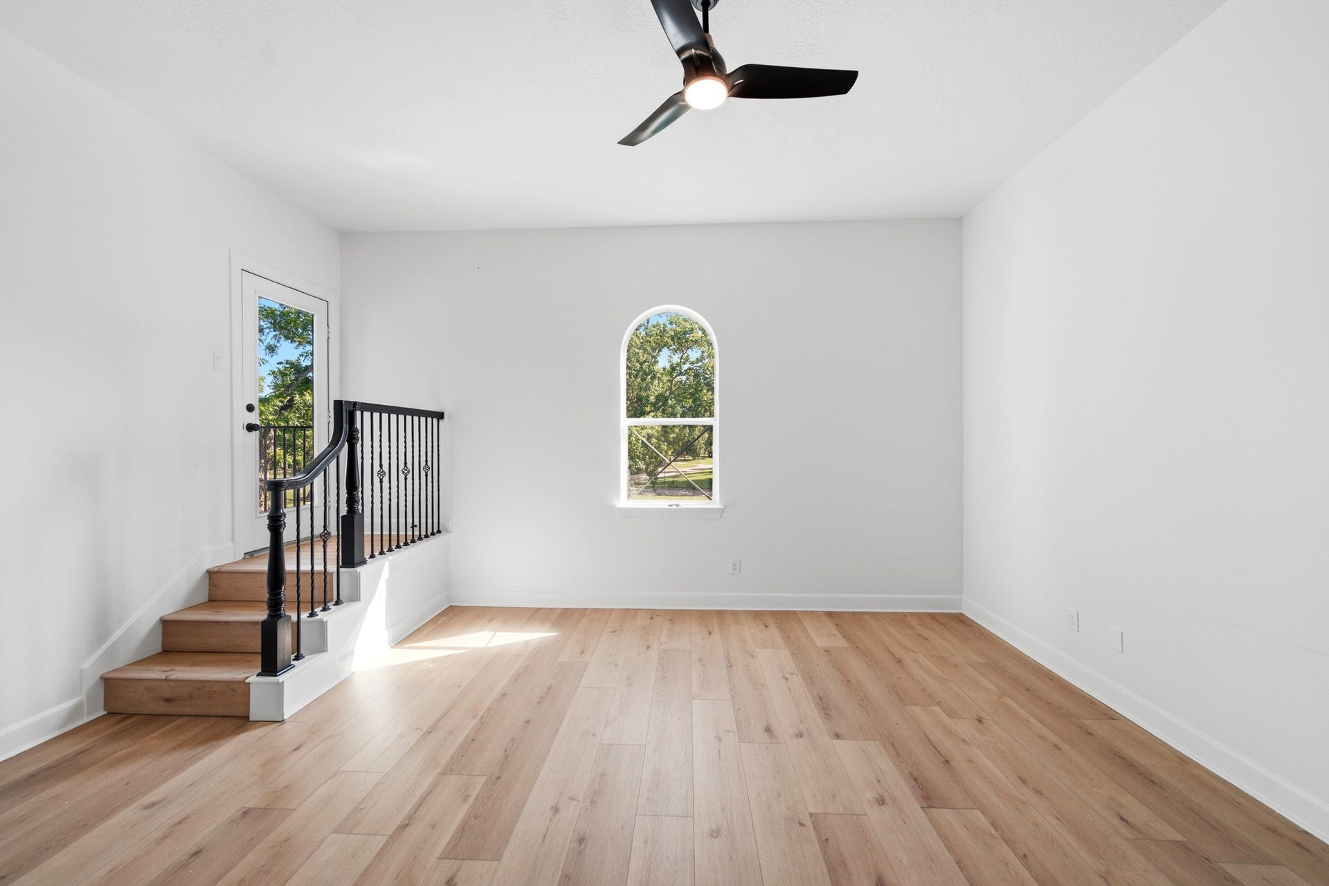 15 Bees Creek Court, Missouri City, TX 77459 Versatile upstairs retreat with private balcony access and abundant natural light.