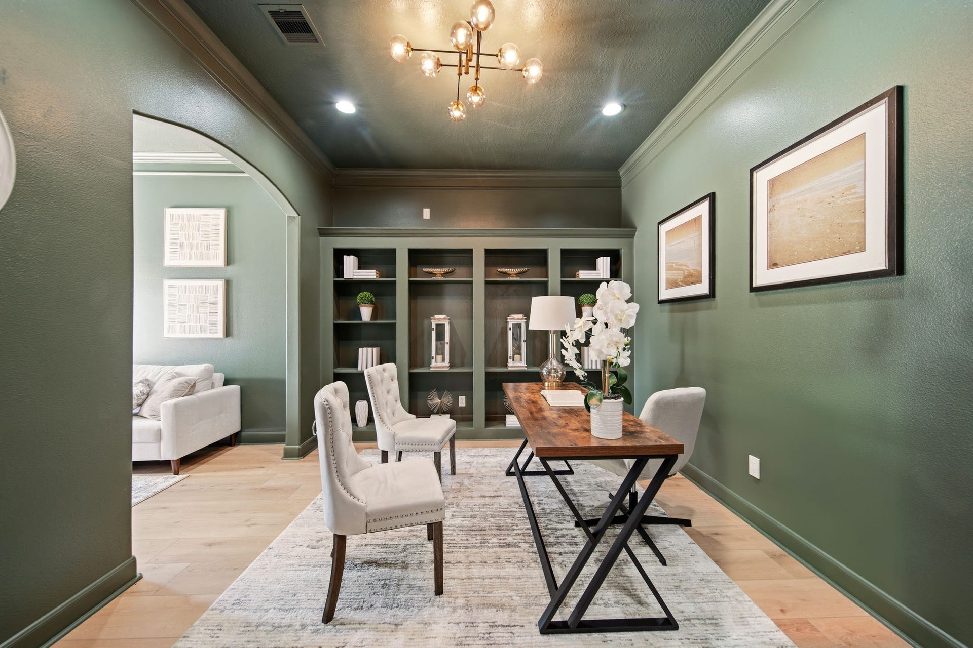 15 Bees Creek Court, Missouri City, TX 77459 Spacious study featuring custom cabinetry, elevated lighting, and flexible workspace design.